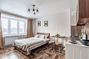 Апартаменты Уютная, светлая студия с видом на набережную!