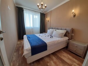 отель Дизайнерская 2 комнатная студия с балконом на 11 этаже 21-го этажного дома с волшебным видом на парк и лесополосу