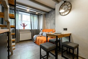 Апартаменты Уютная двухуровневая студия