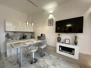 отель Апартаменты с отдельной спальней и камином