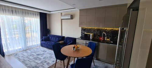 Апартаменты Уютная солнечная квартира 1+1 в Газипаше