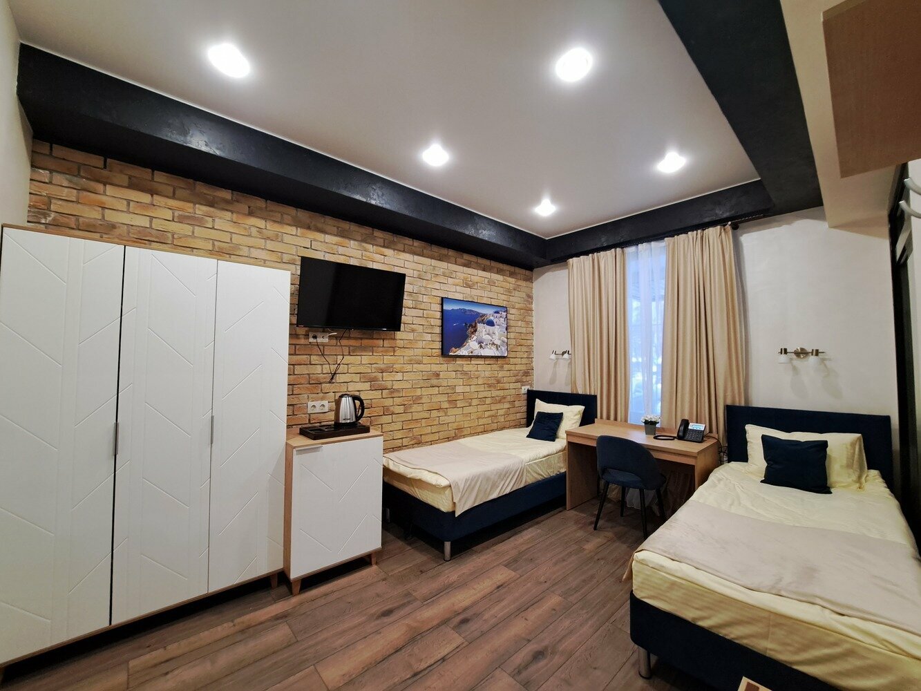 Улучшенный двухместный номер с 2 отдельными кроватями