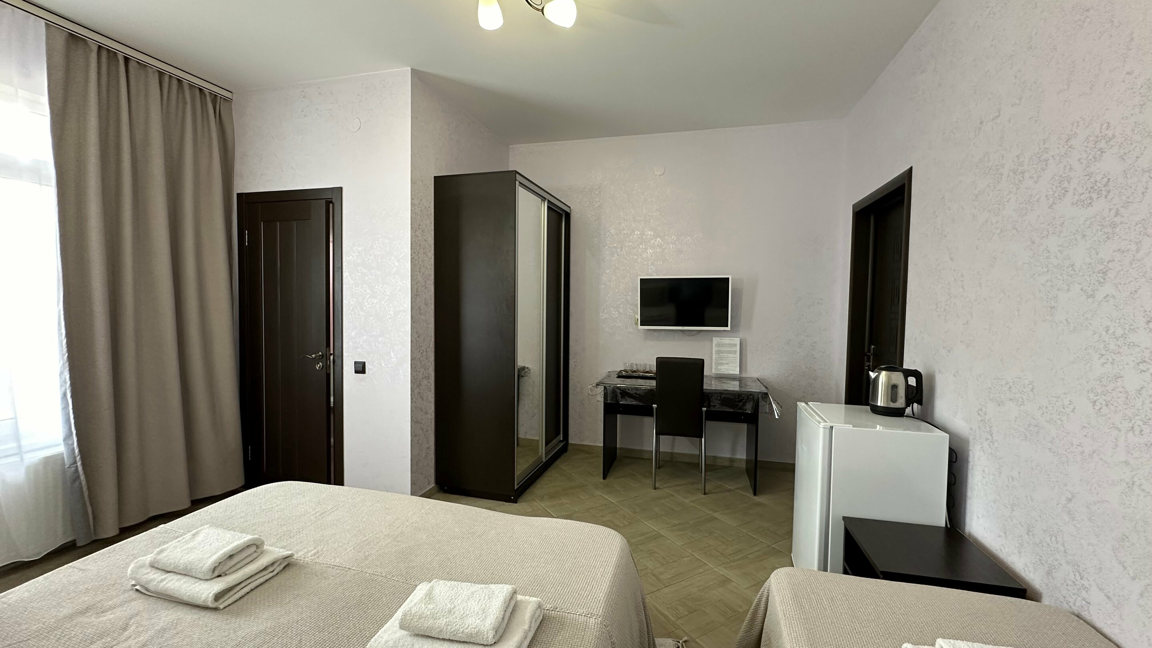 Улучшенный трехместный номер