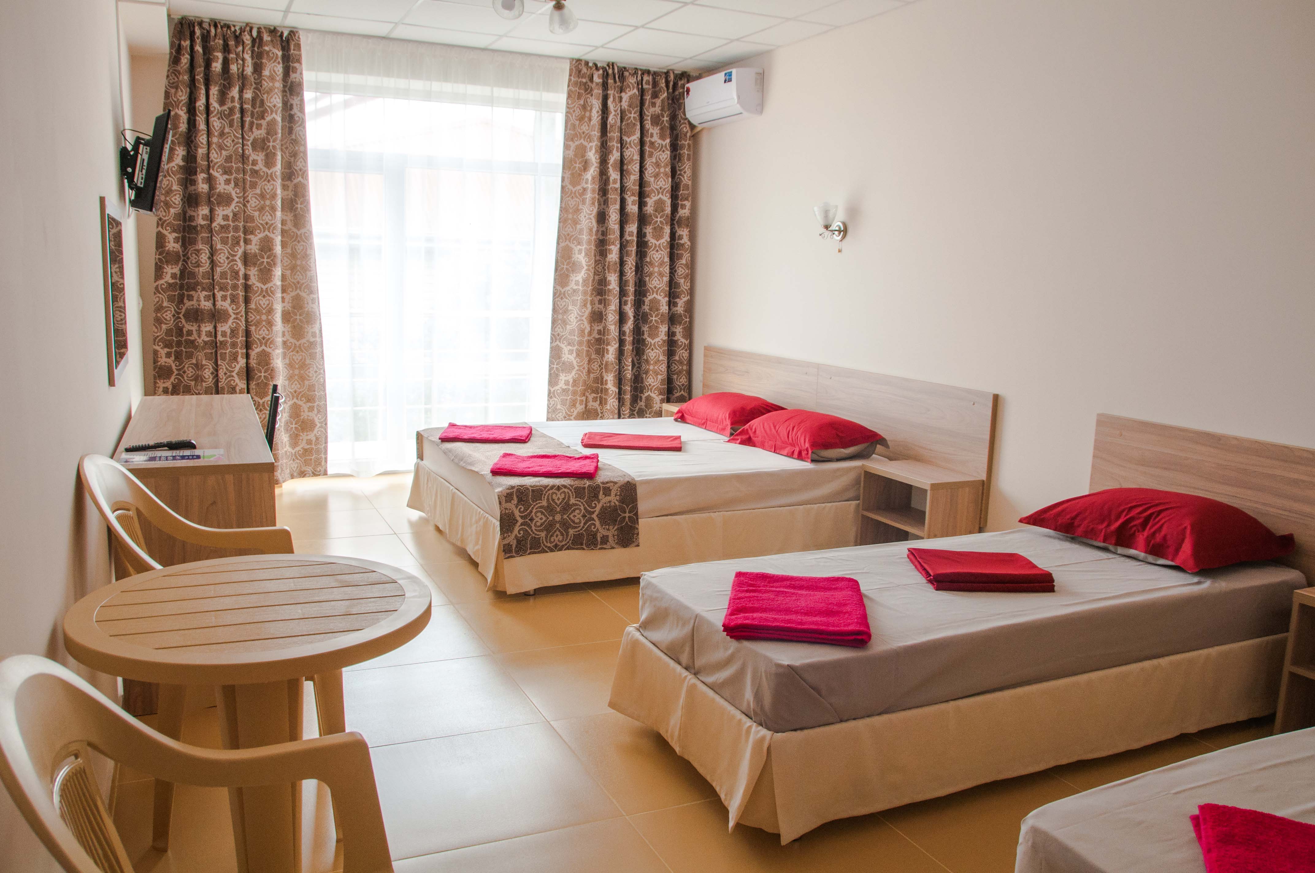 Четырехместный номер с балконом