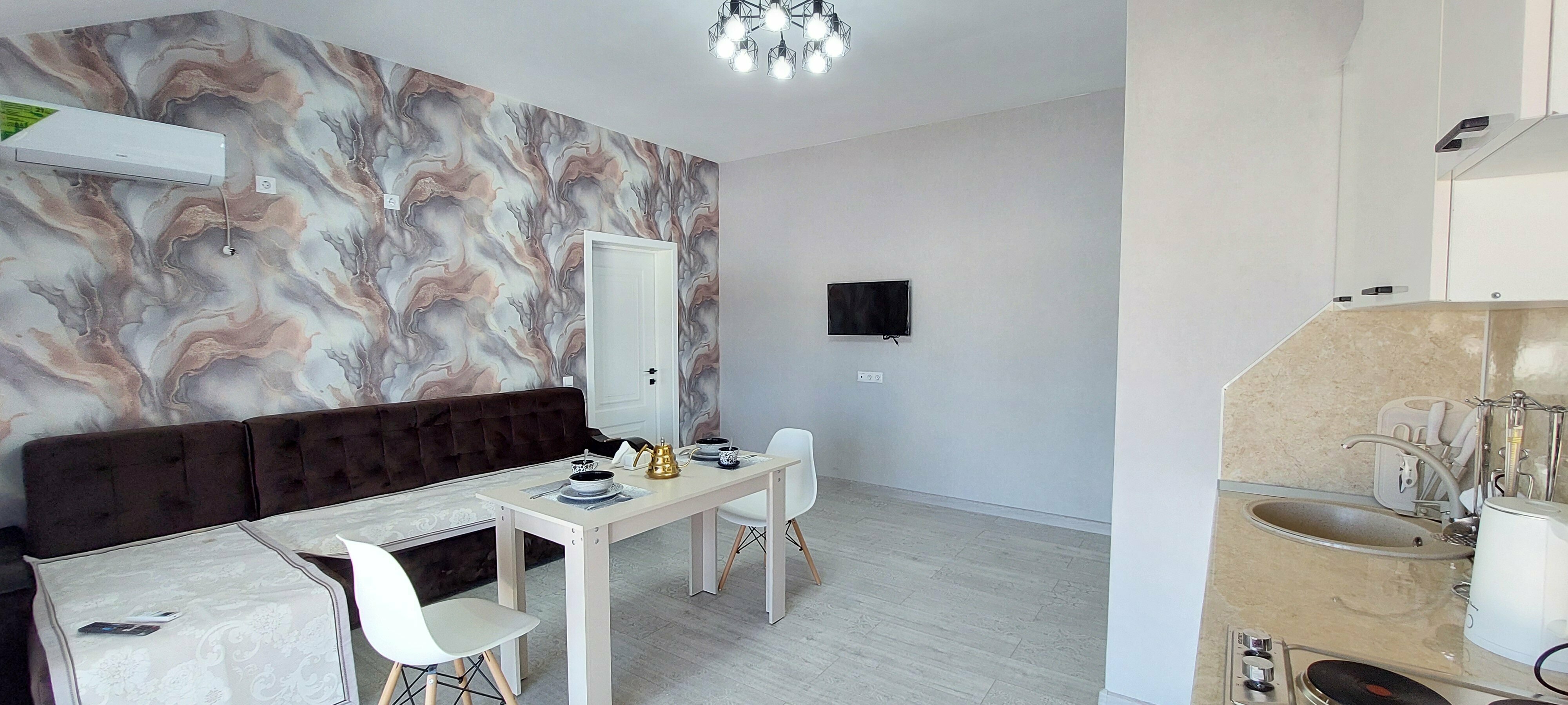 Семейный номер с боковым видом на море