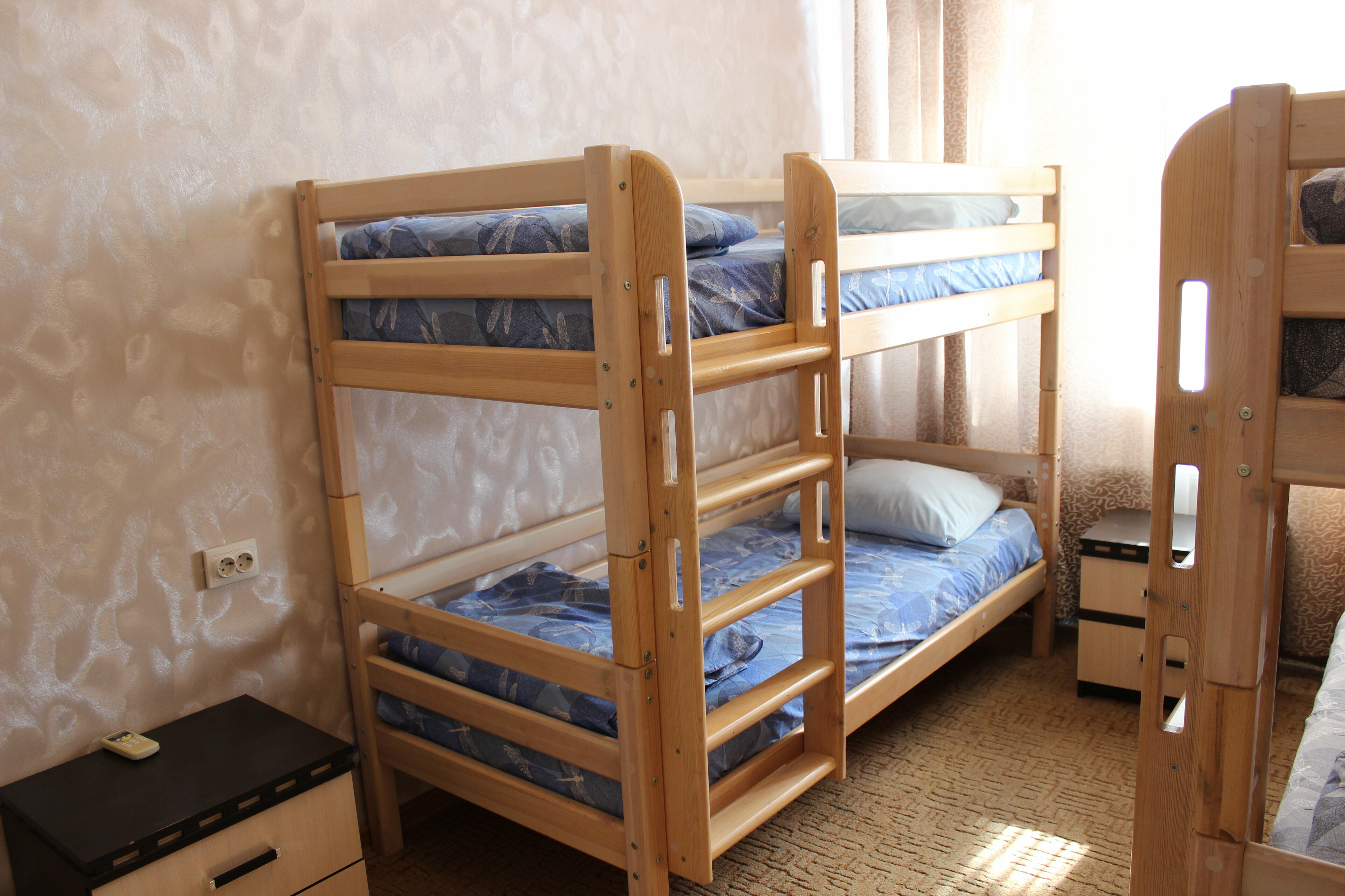 Четырехместный номер с общей ванной комнатой