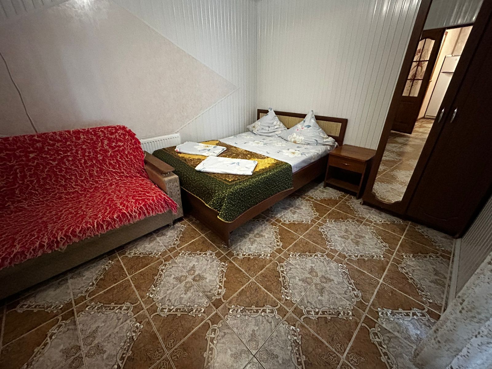 Улучшенный четырехместный номер