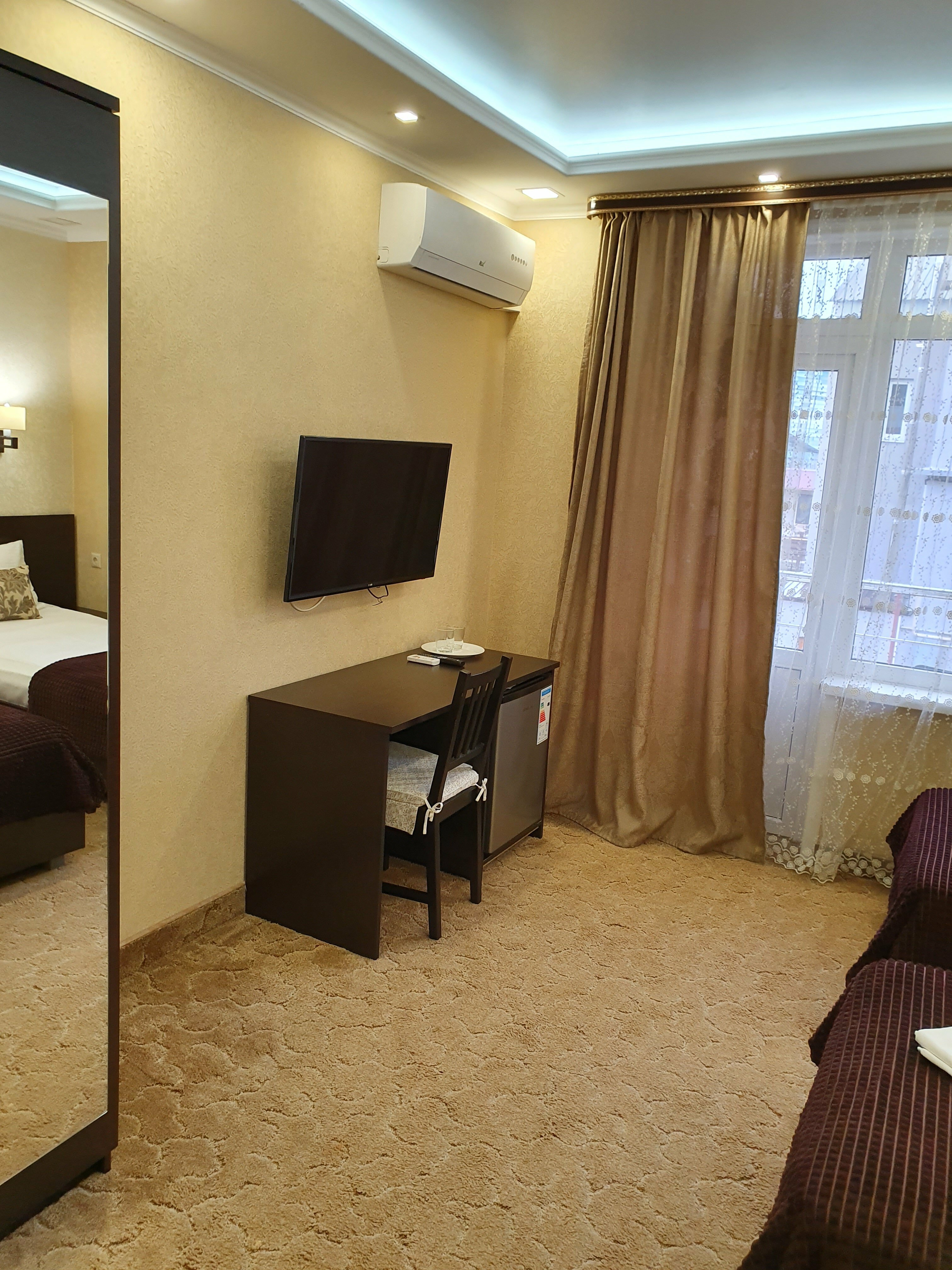 Двухместный номер с 2 отдельными кроватями и балконом