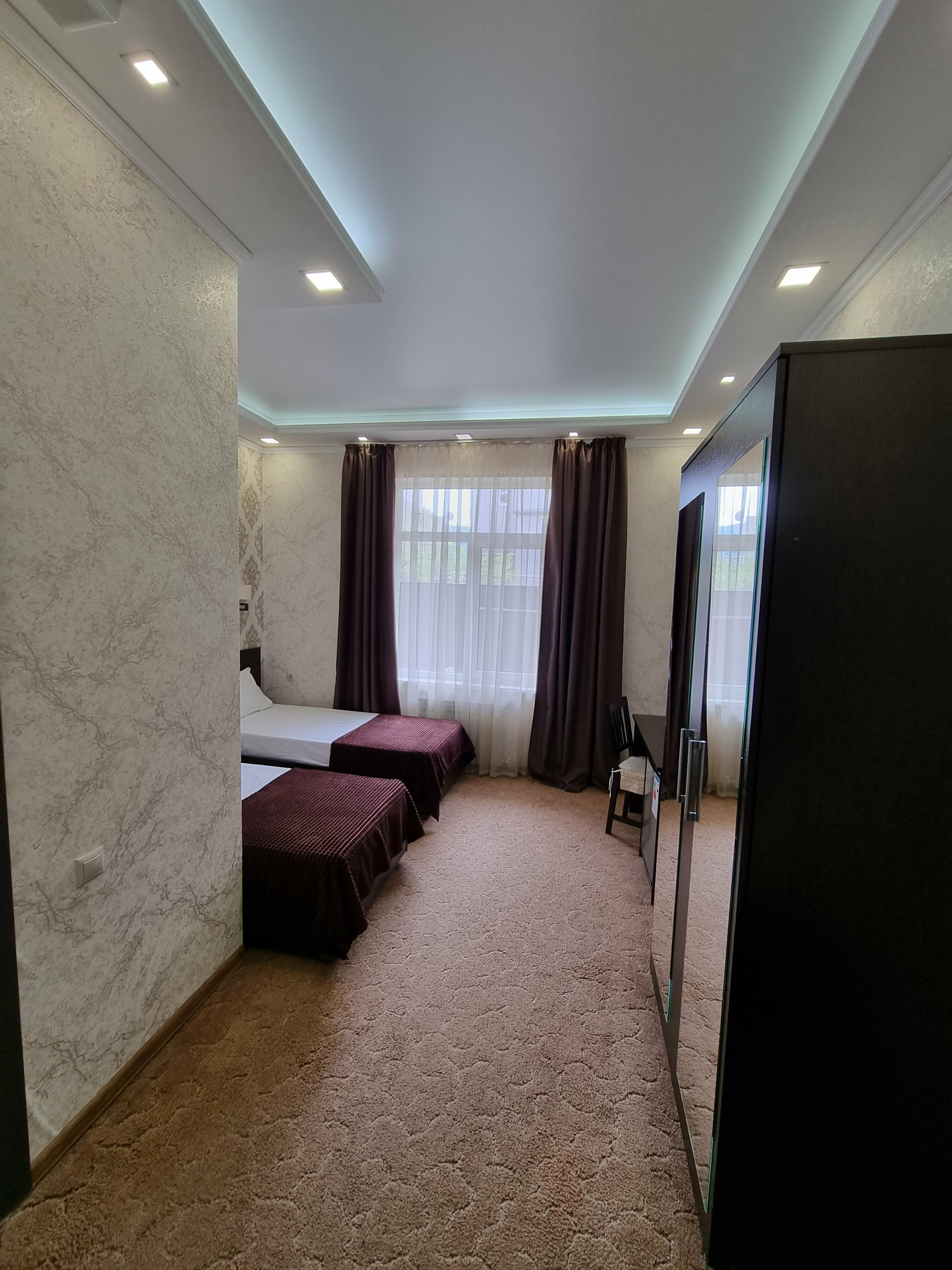 Двухместный номер с 2 отдельными кроватями и душем