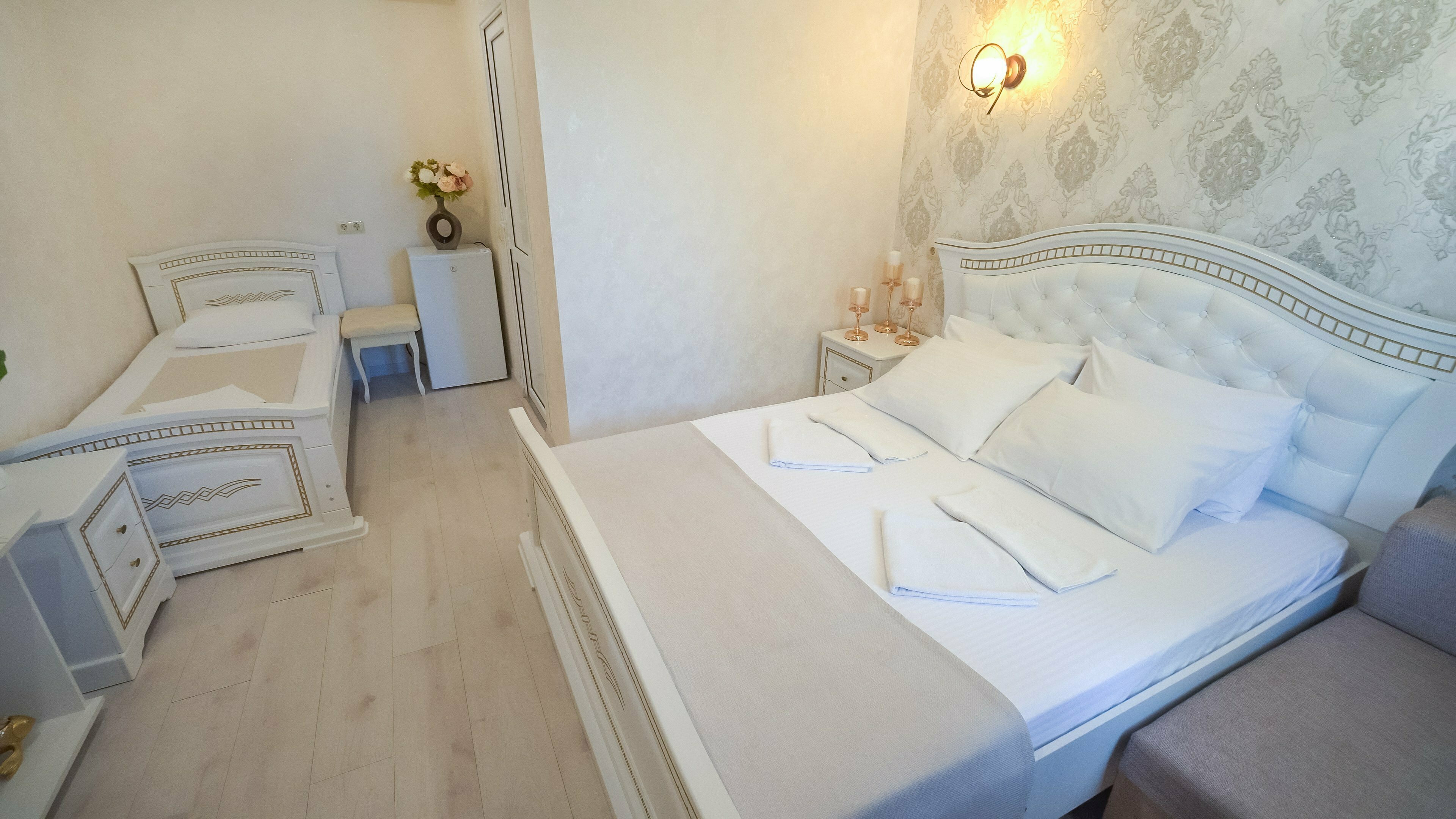 Семейный номер с видом на сад