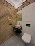 Стандартный трехместный номер в New Riga Village