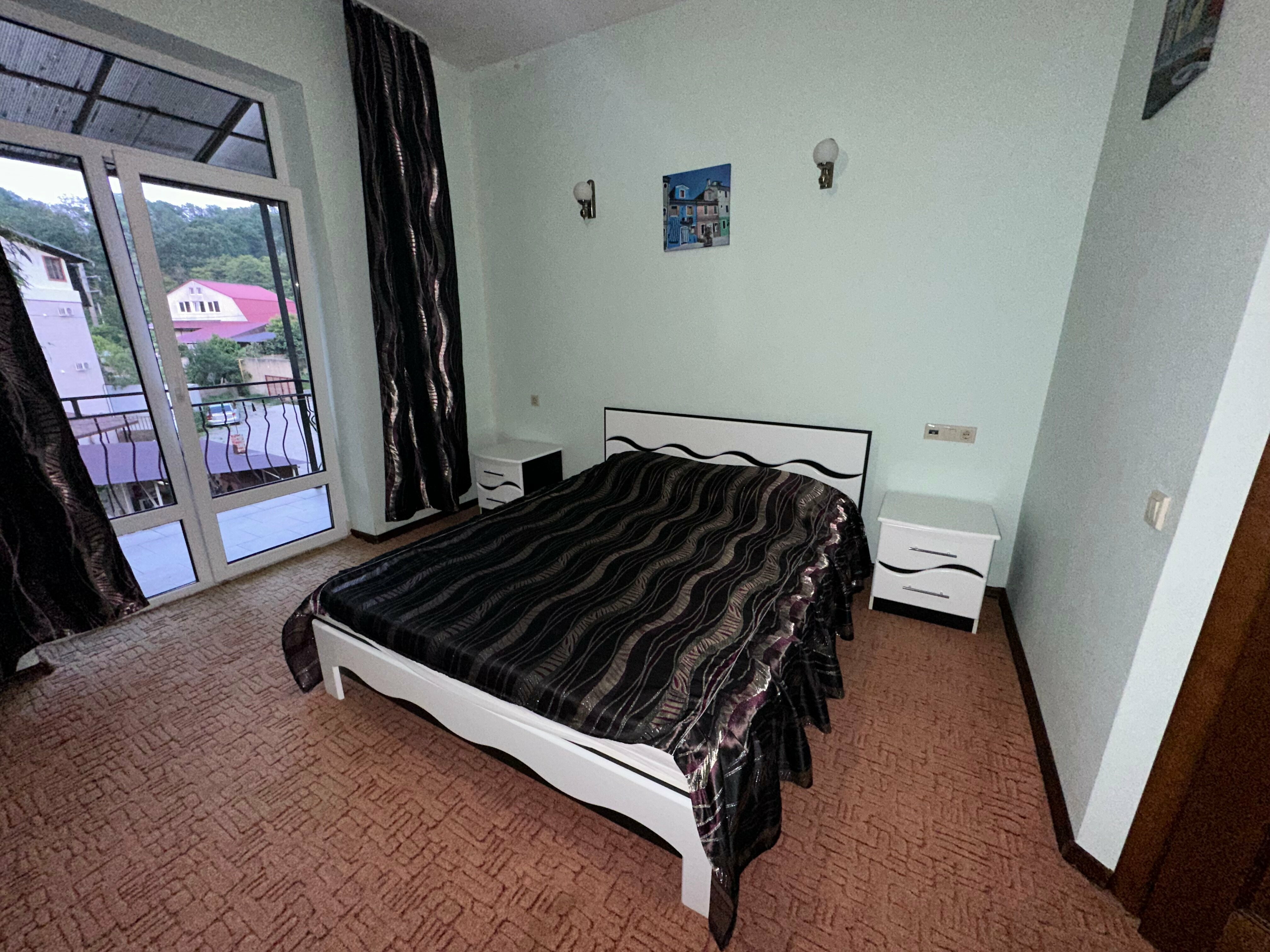 Трехместный номер Делюкс