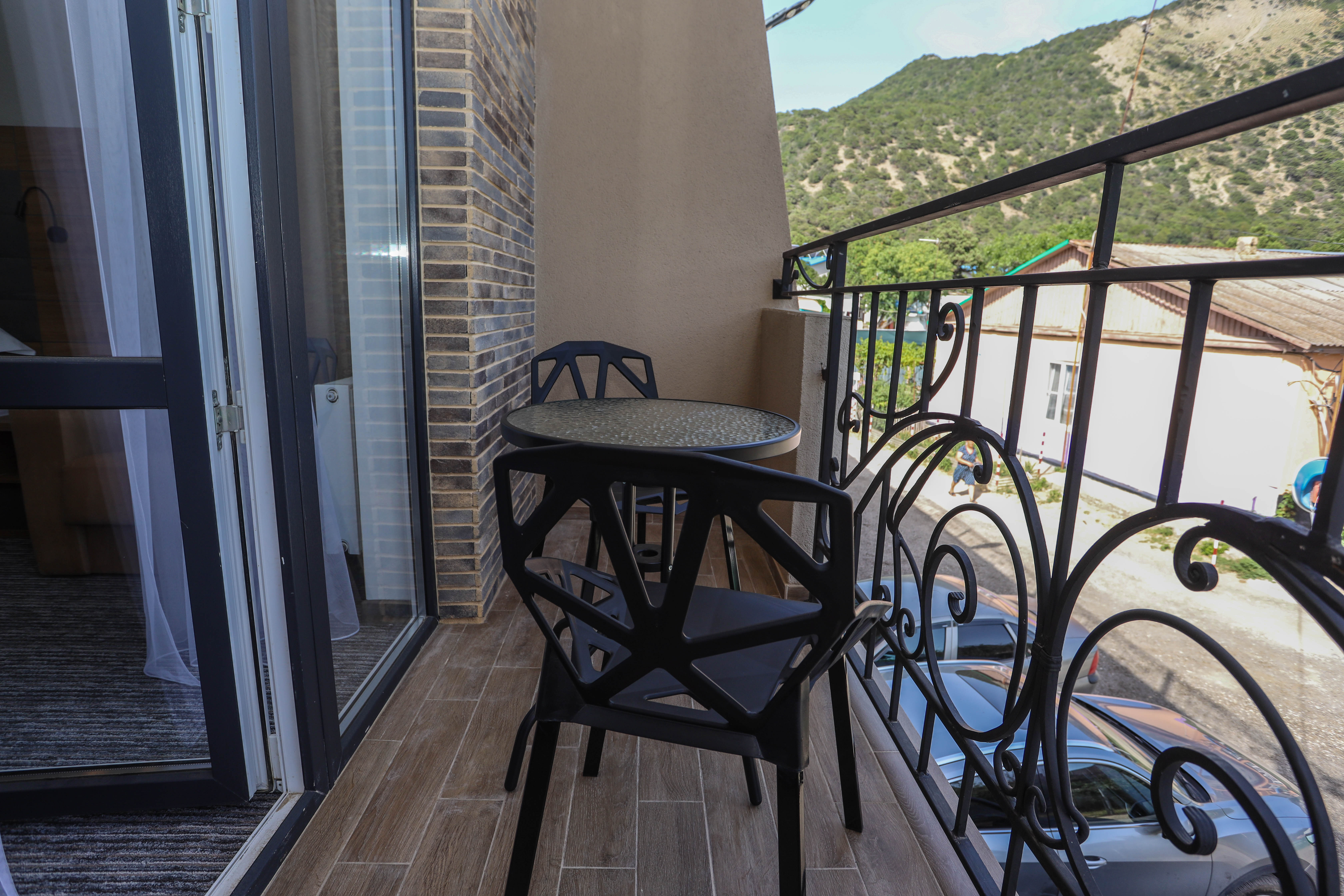 Трехместный номер с балконом