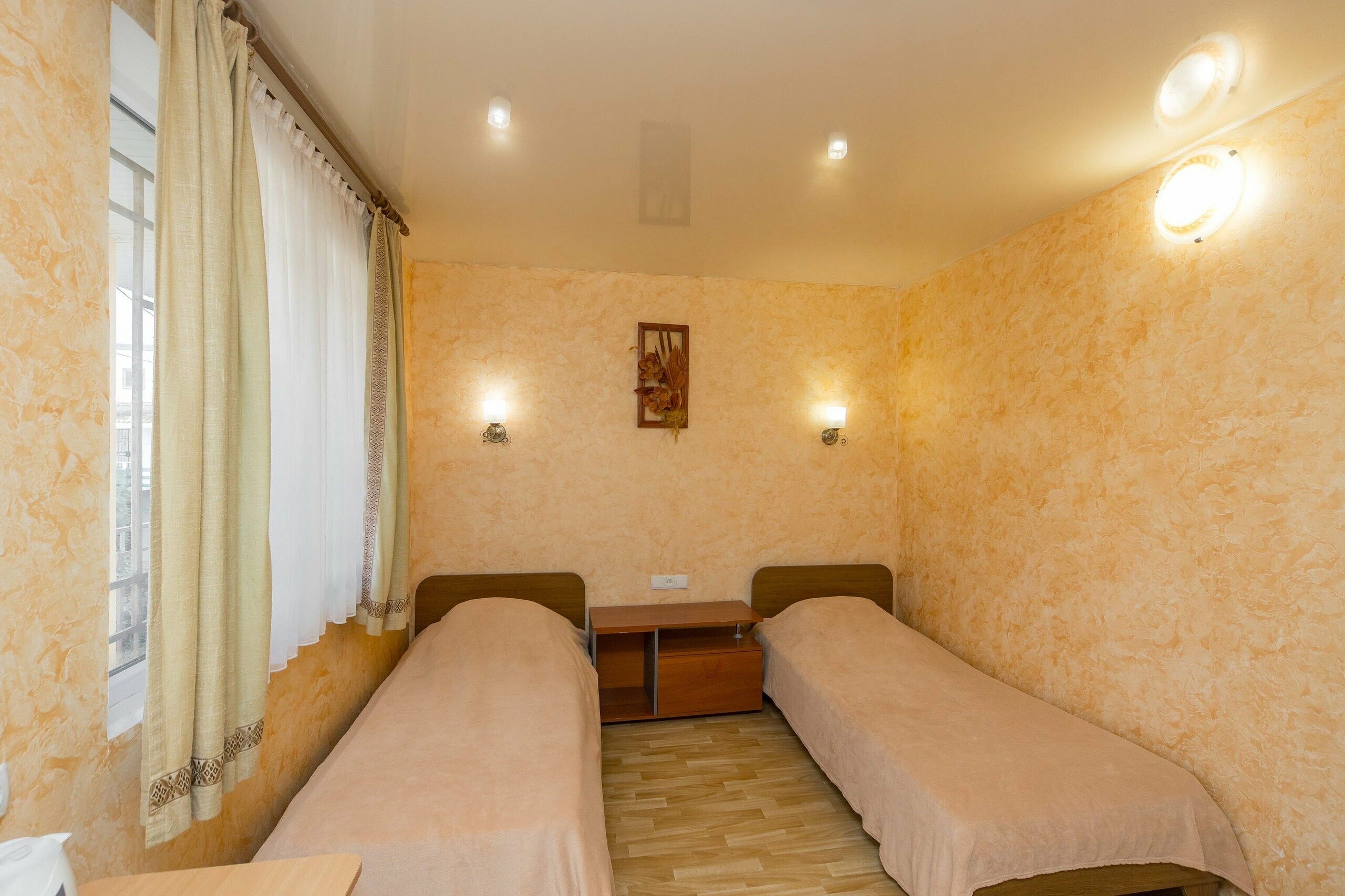 Двухместный номер с 2 отдельными кроватями и балконом