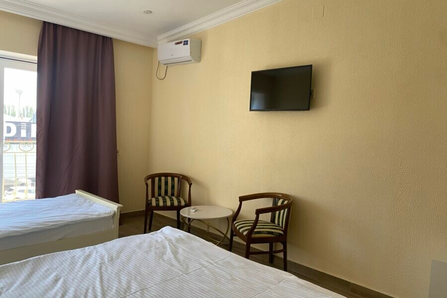 Трехместный номер с балконом