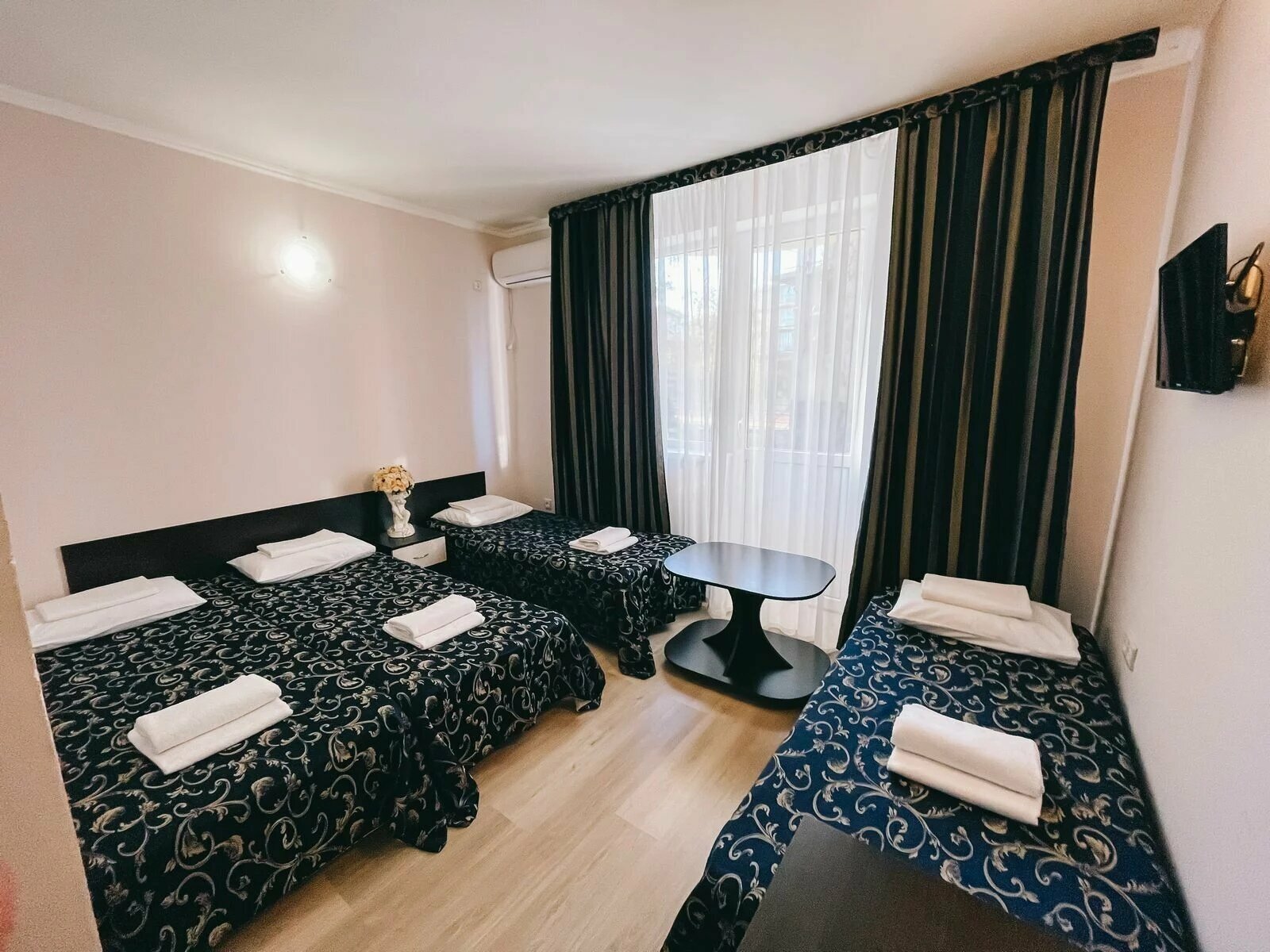 Четырехместный номер с балконом