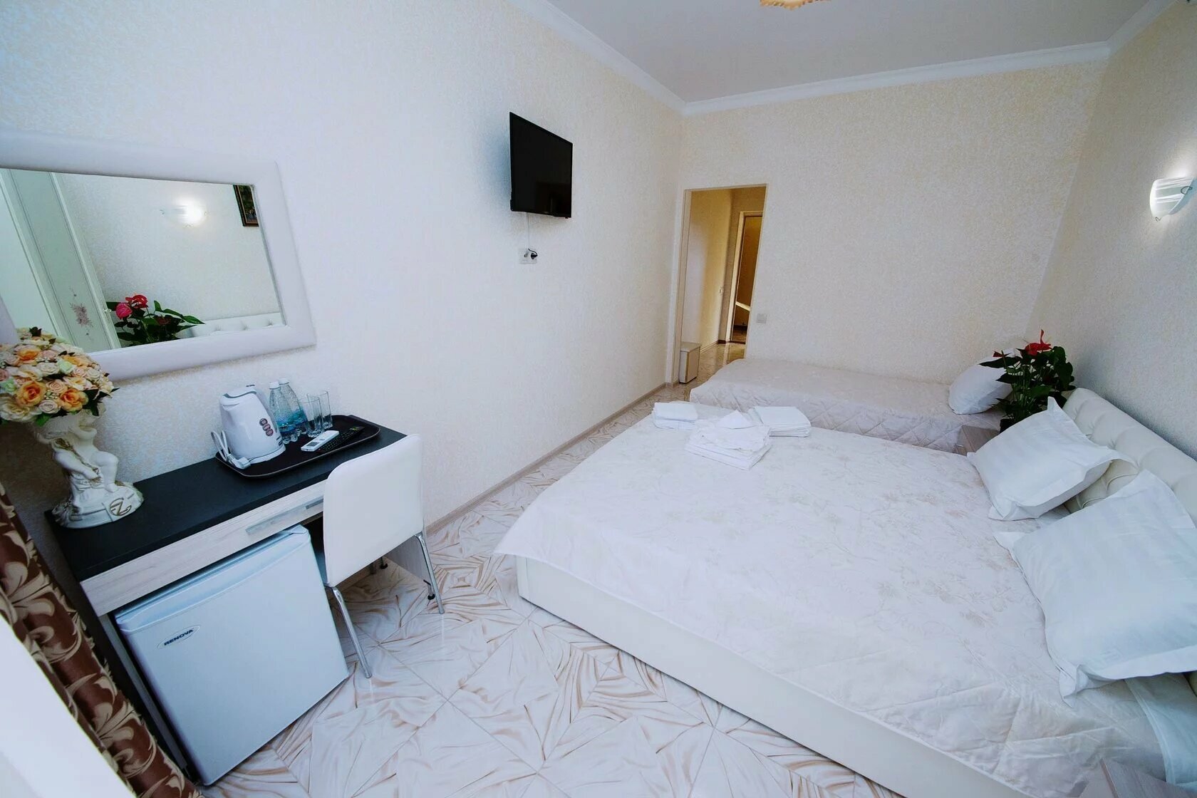 Трехместный номер с балконом