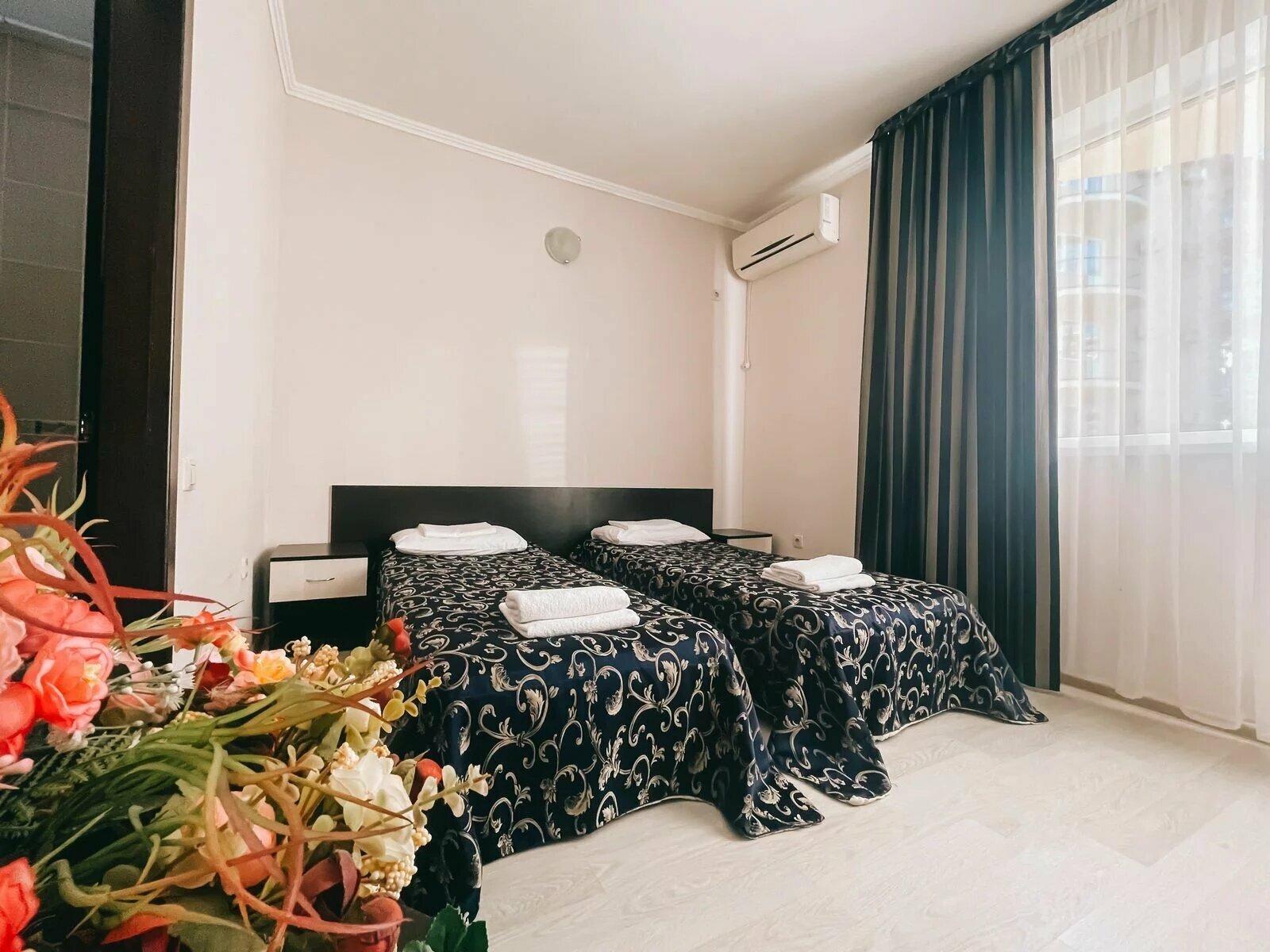 Трехместный номер с балконом