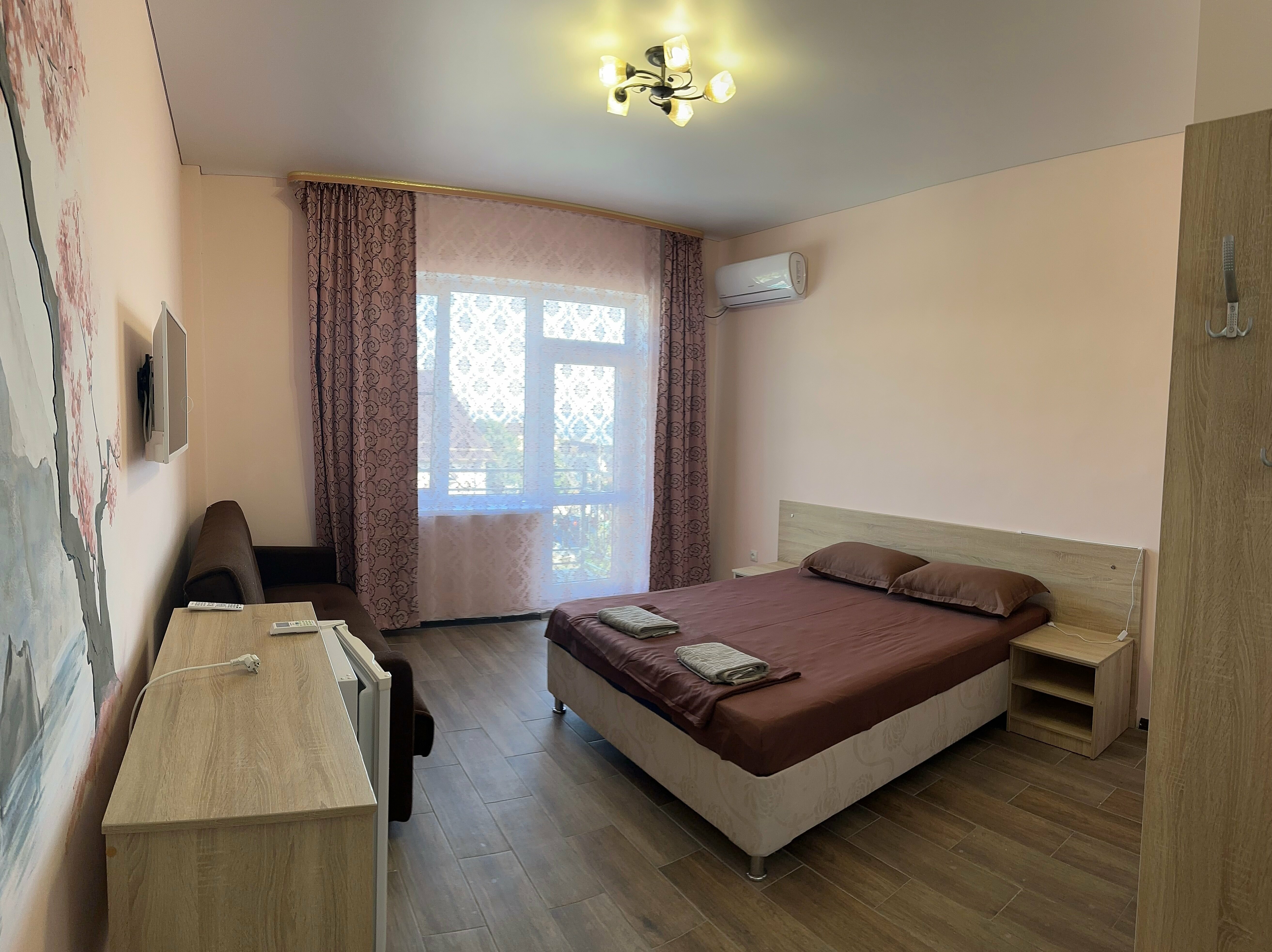 Четырехместный номер с балконом