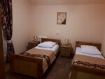 Номер улучшенный стандарт с 2 односпальными кроватями в Казачий Стан
