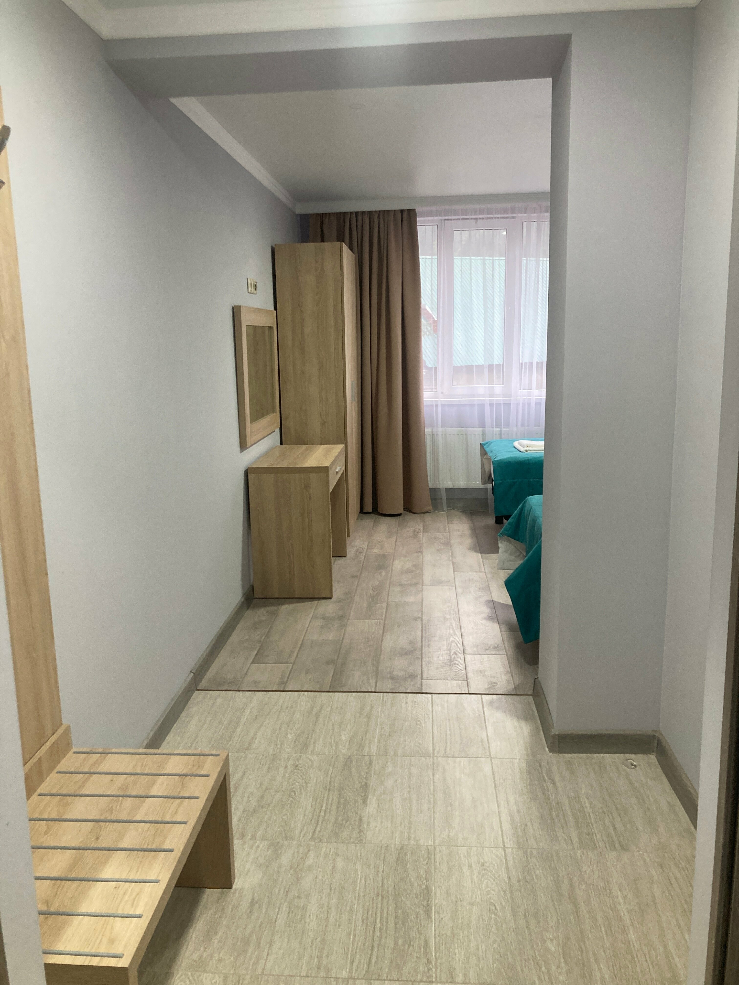 Двухместный номер с 2 отдельными кроватями и окном