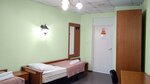 Кровать в 3-местном общем женском номере в Smart Hotel КДО Ладожский