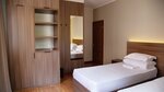 Номер стандарт с 2 односпальными кроватями в People Hostel & Suites