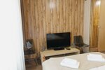 Улучшенный четырехместный номер в A-House Hotel