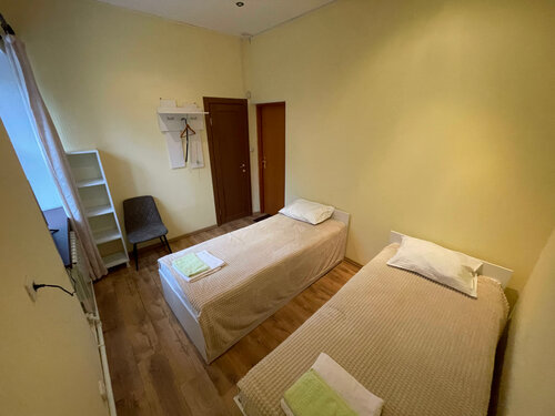 Двухместный номер с 2 отдельными кроватями и душем