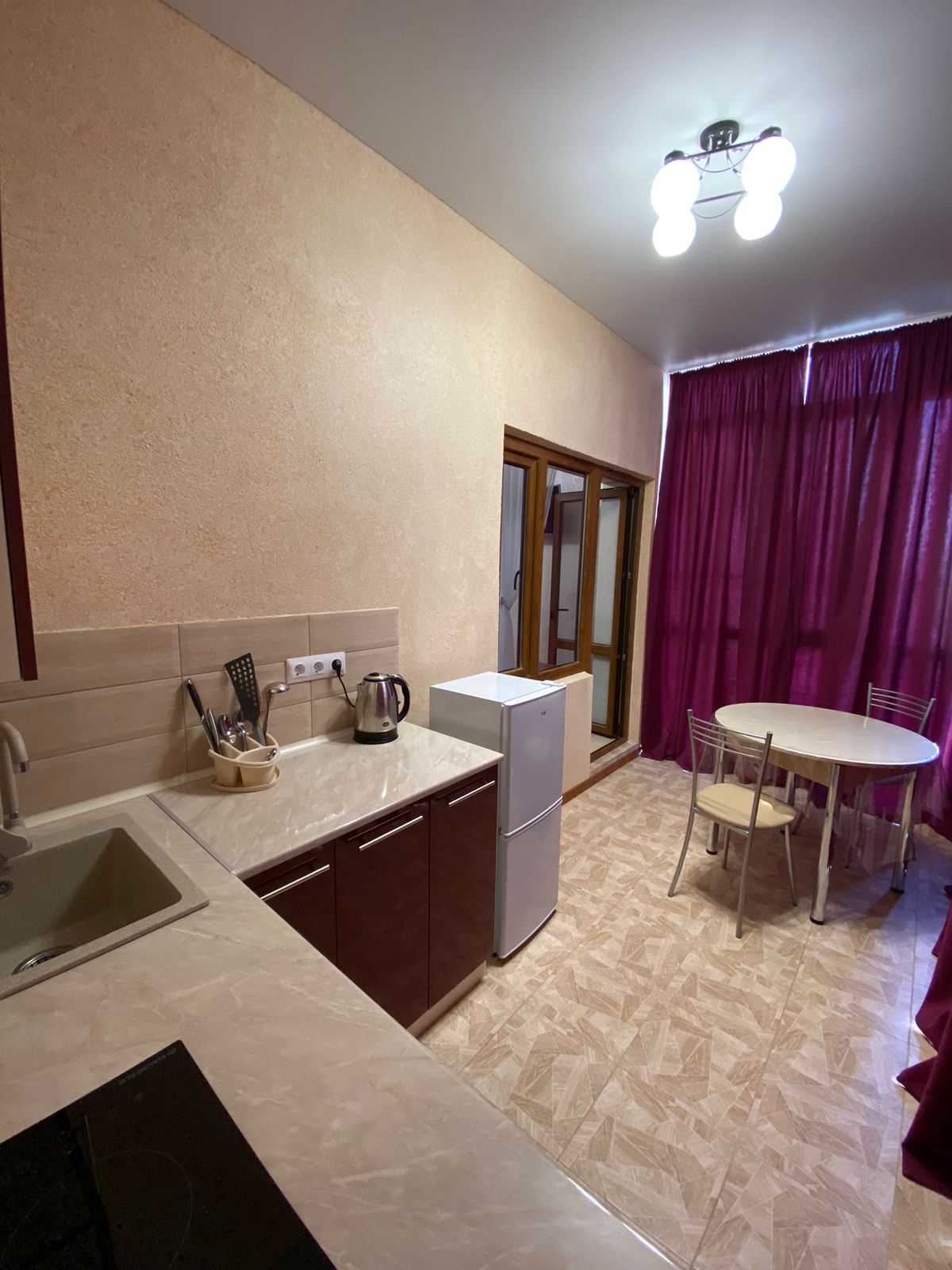 Трехместный номер с балконом