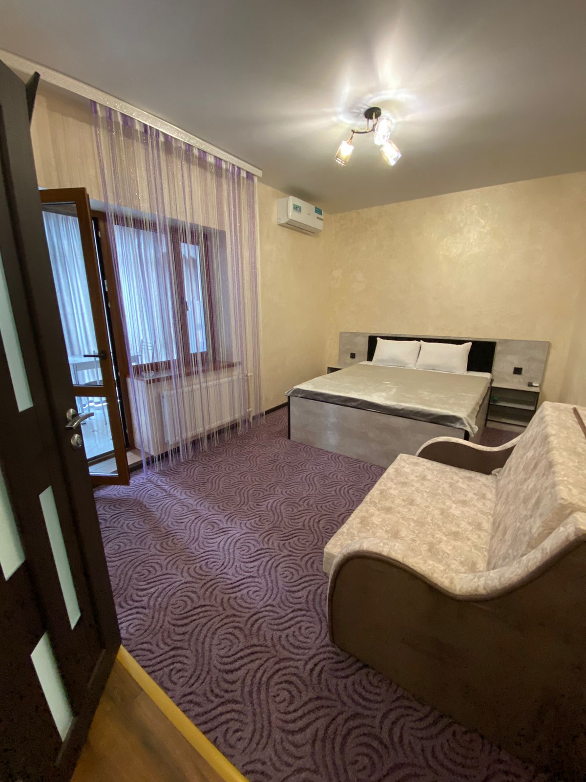 Трехместный номер с балконом