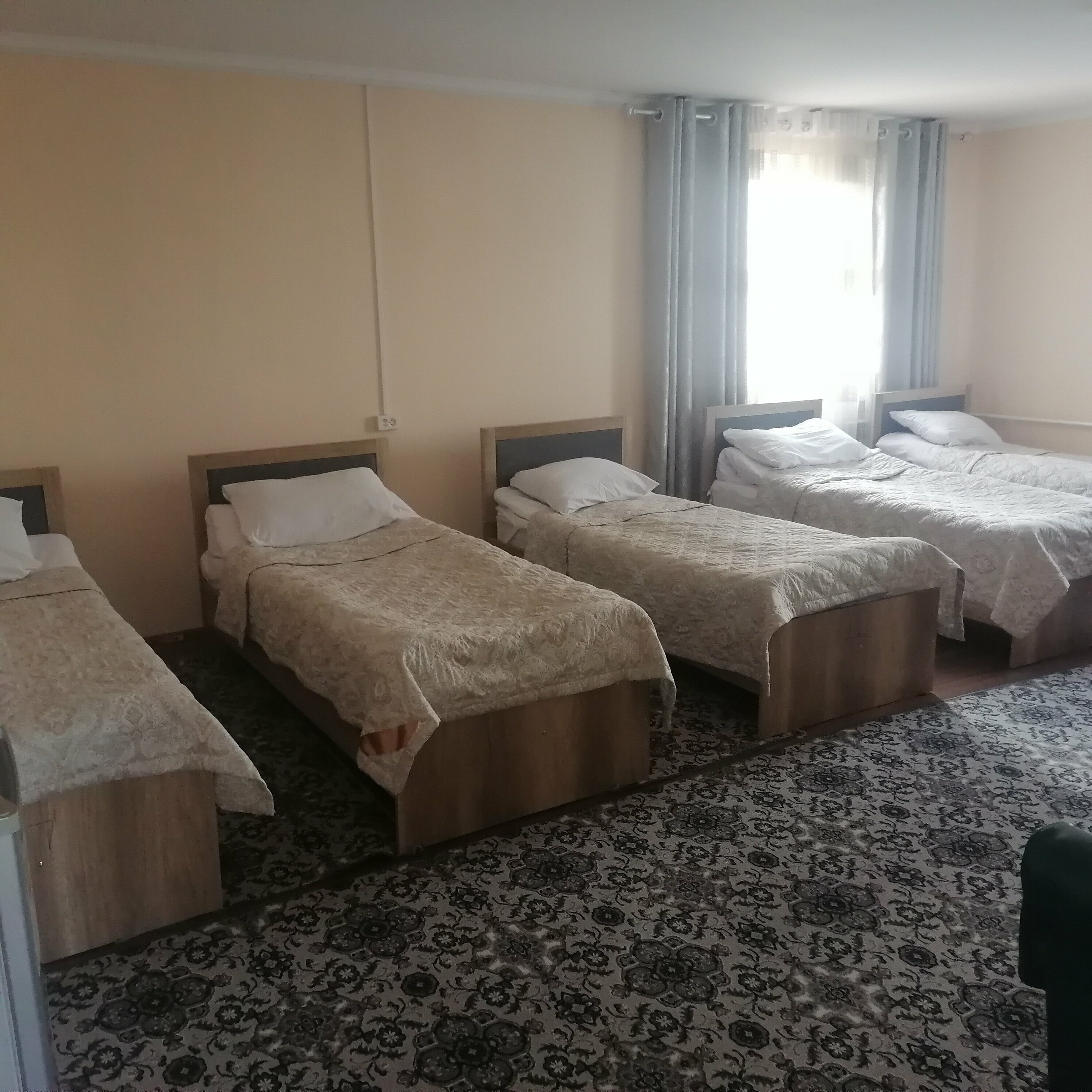 Улучшенный четырехместный номер