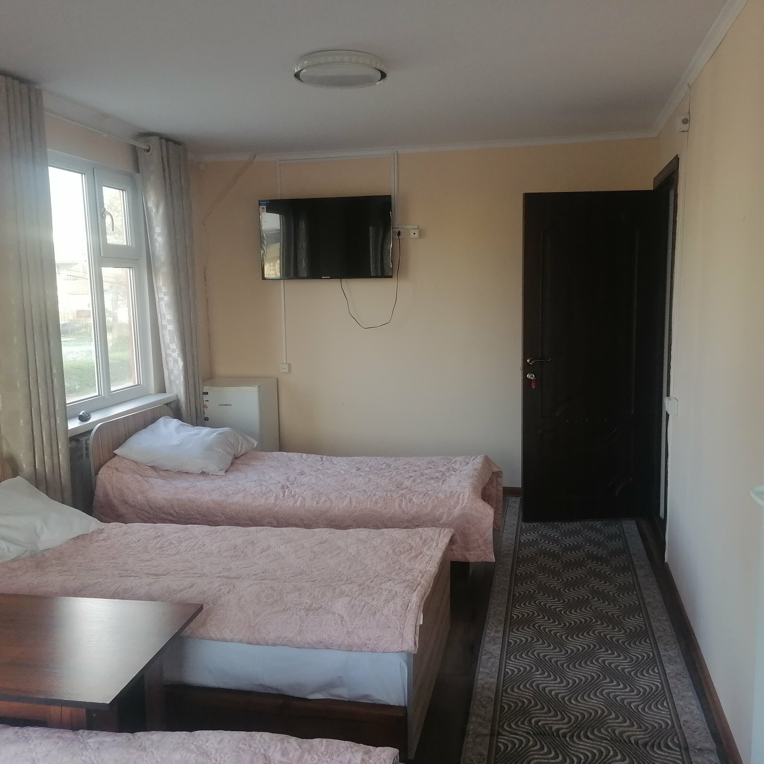 Улучшенный четырехместный номер