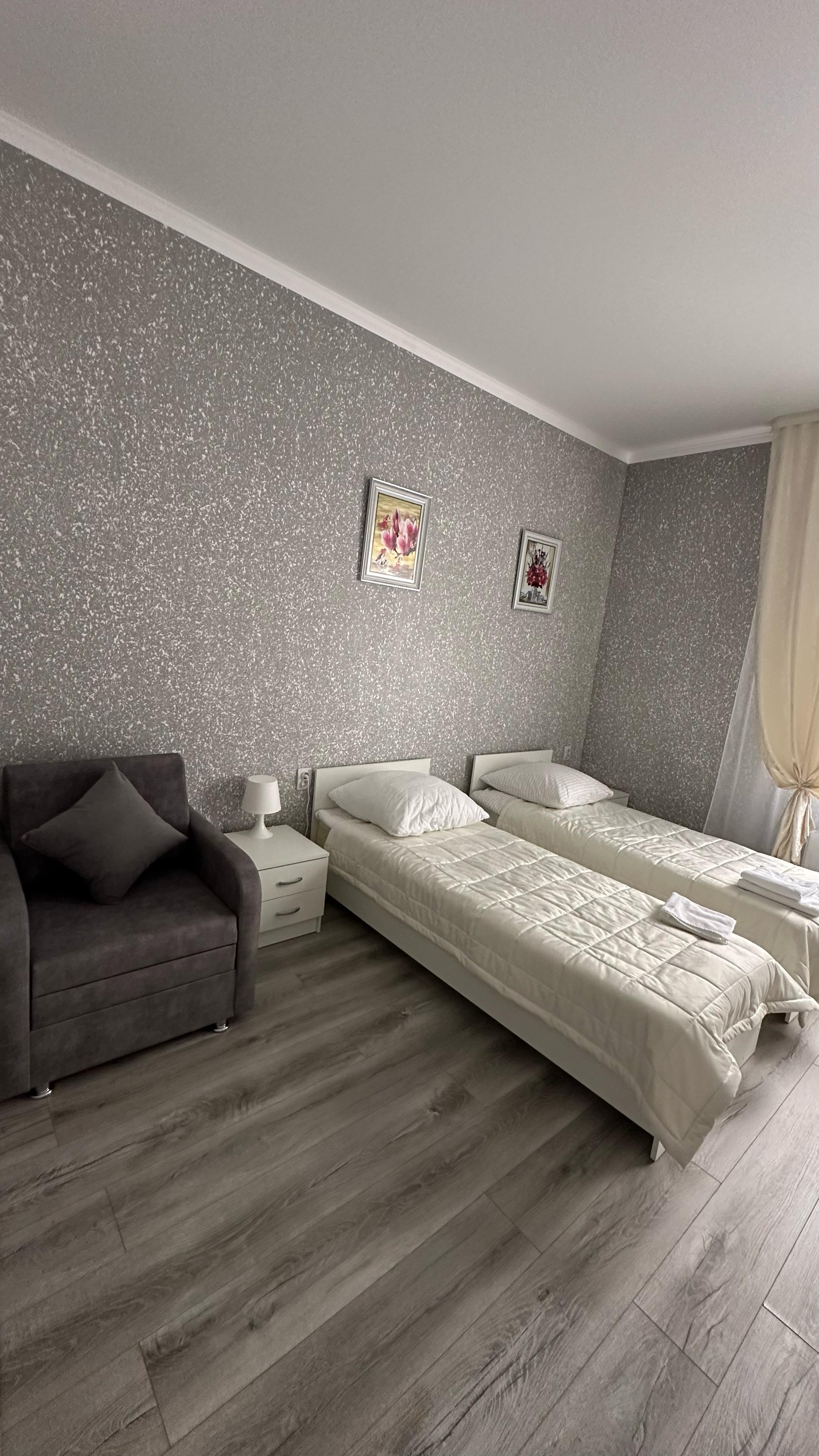 Трехместный номер Делюкс