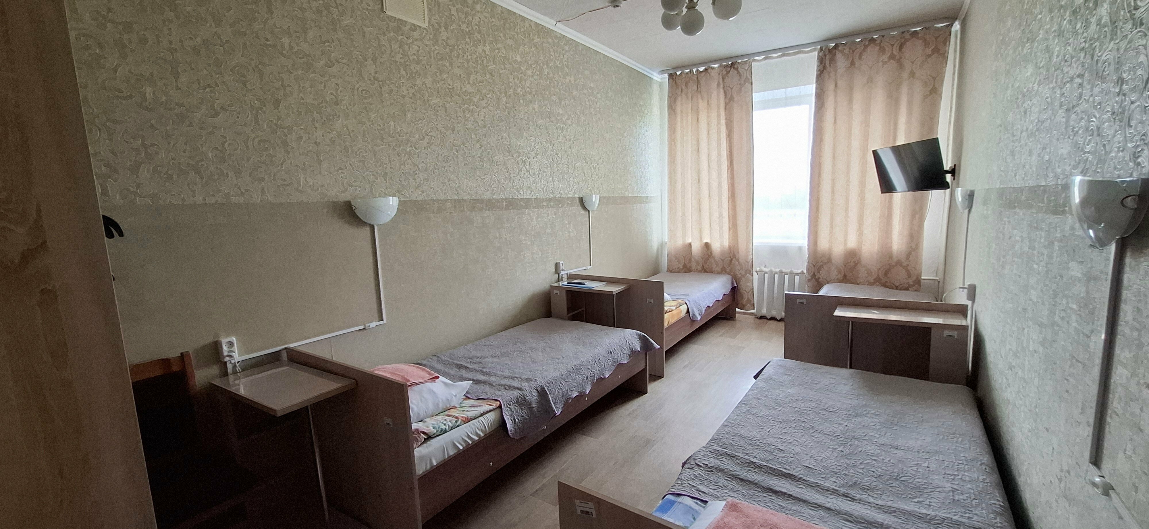 Кровать в общем номере с 4 кроватями