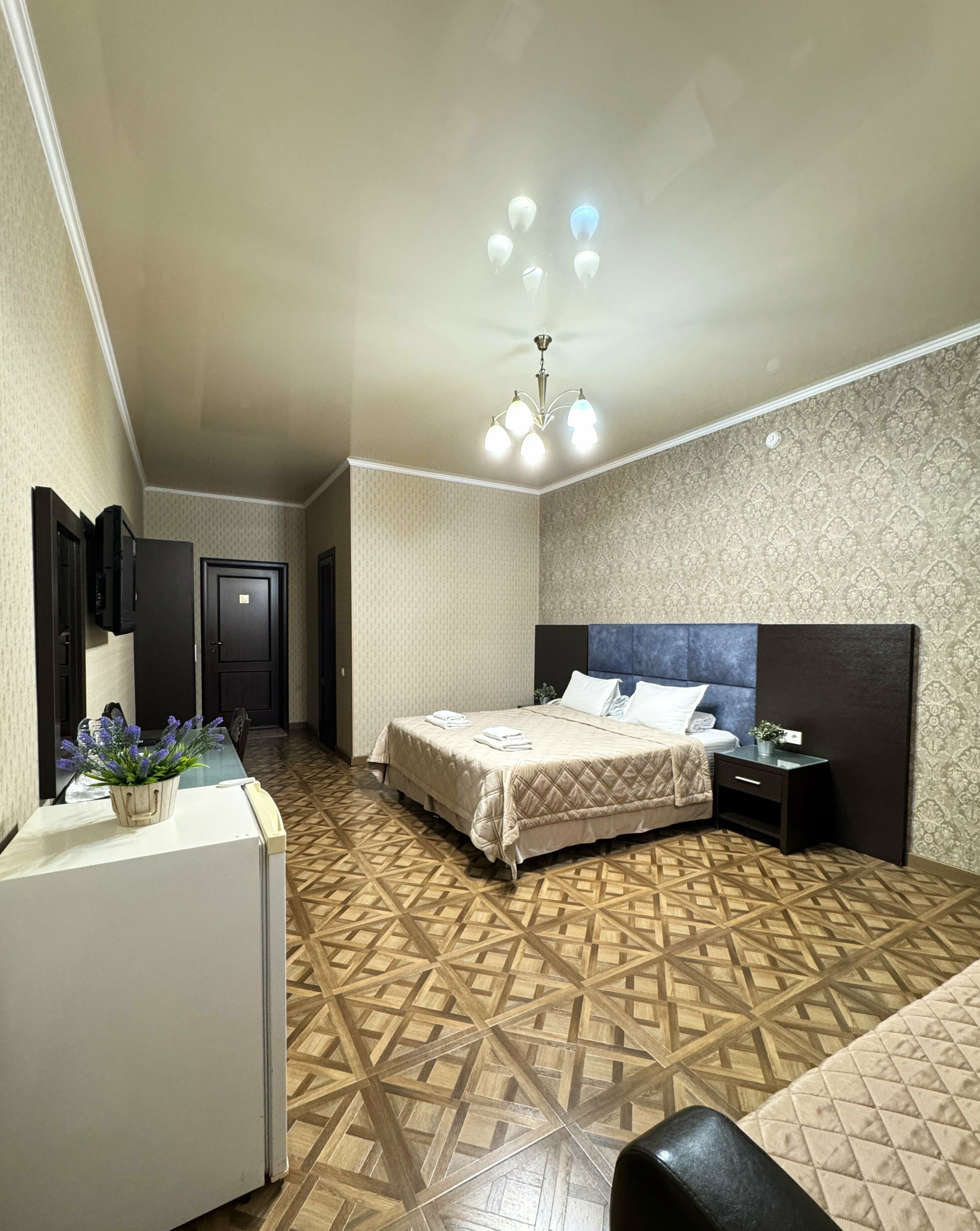 "Семейный" deluxe четырехместный (цокольный этаж)