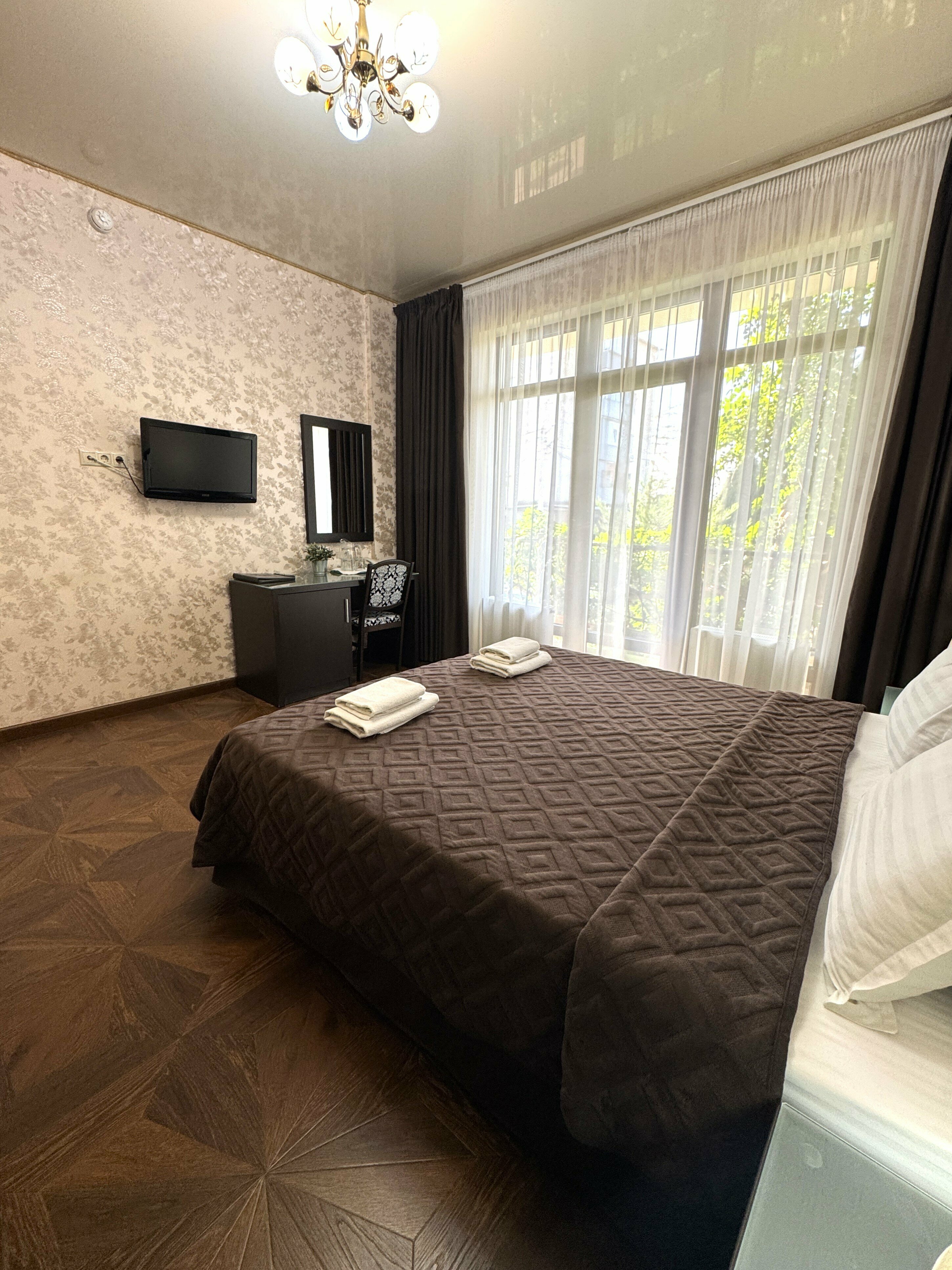 Deluxe двухместный с общей террасой (1 этаж), с доп местом