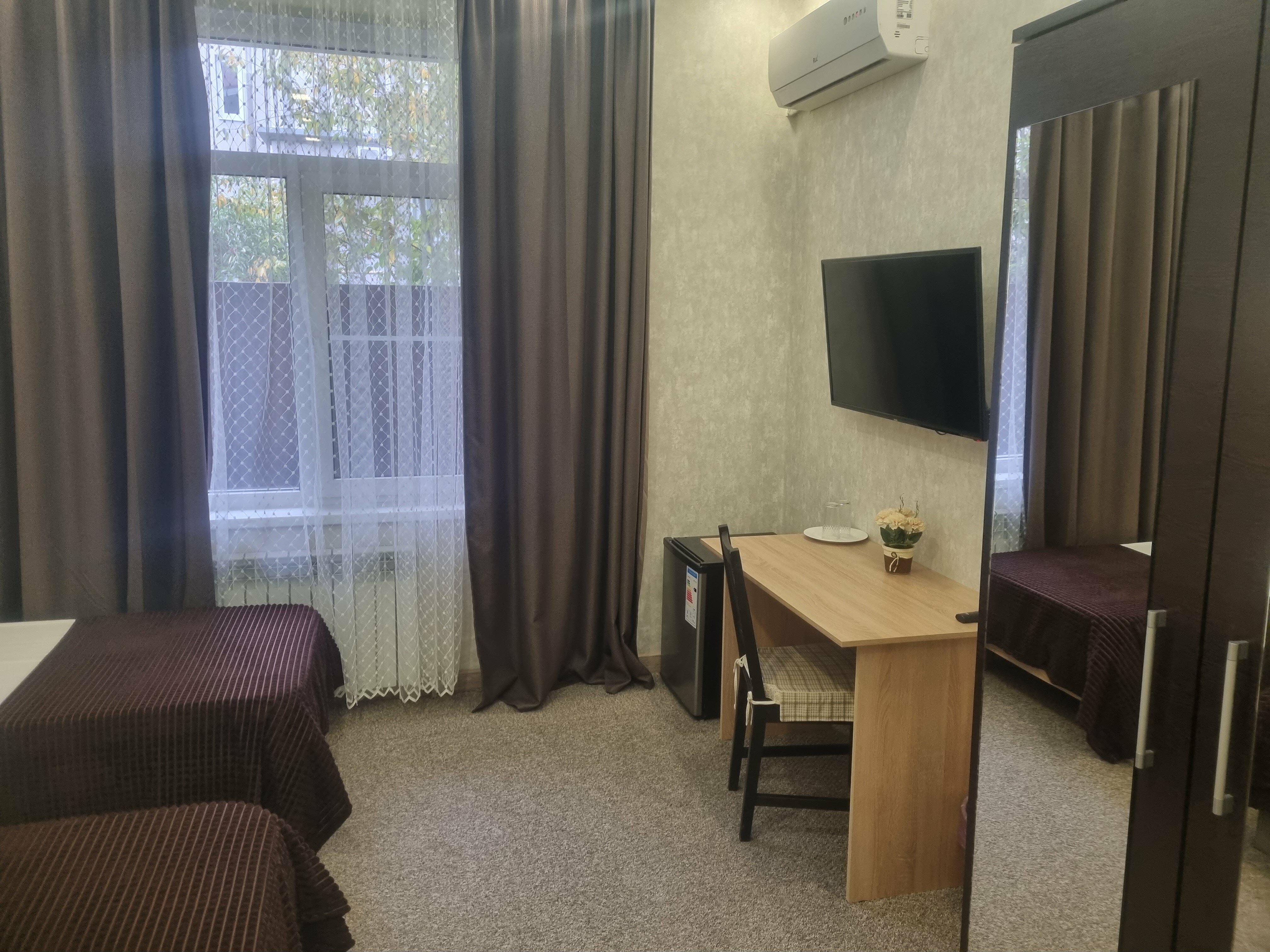 Двухместный номер с 2 отдельными кроватями и душем