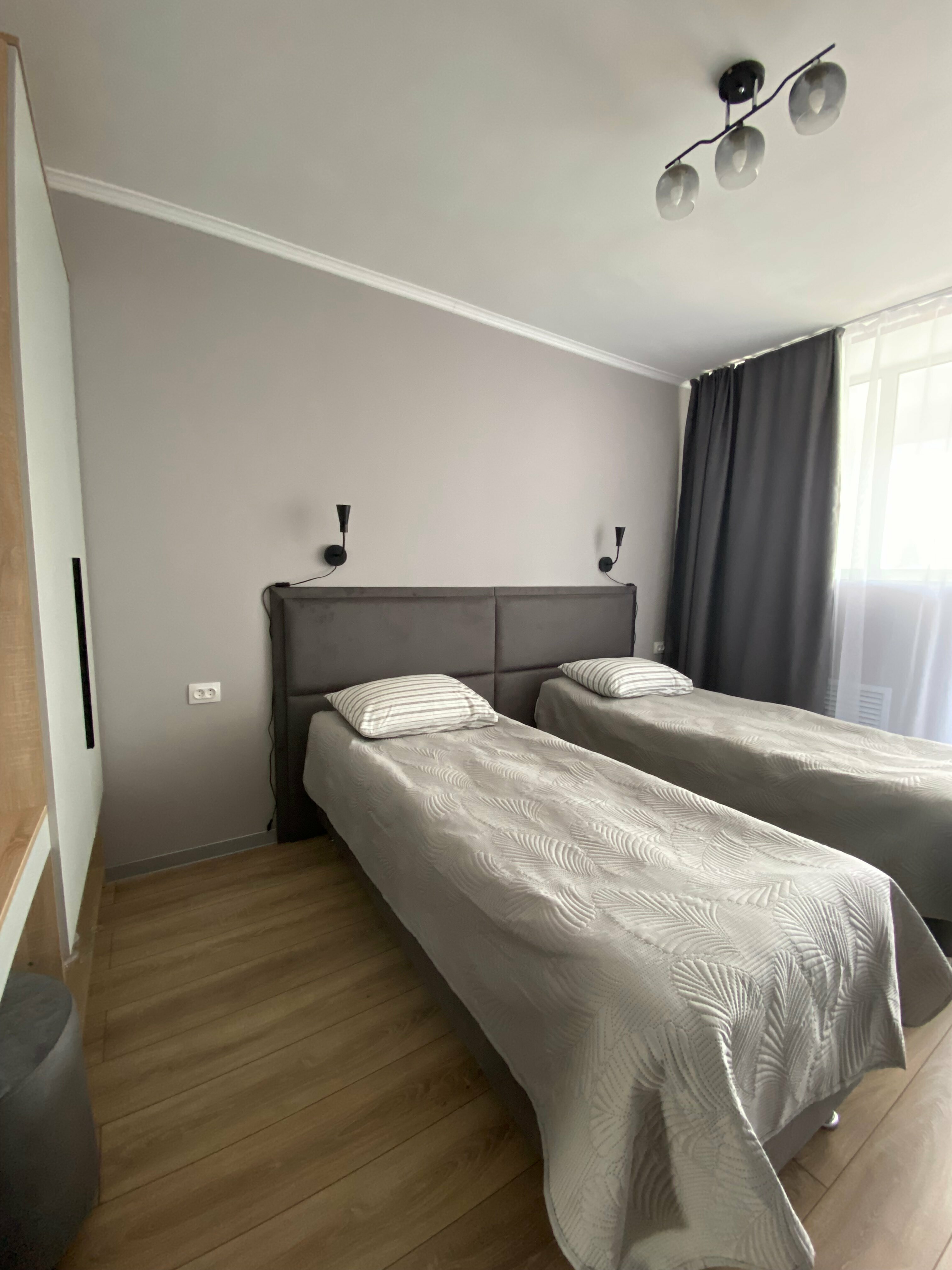 Двухместный номер с 1 кроватью или 2 отдельными кроватями и общей ванной комнатой