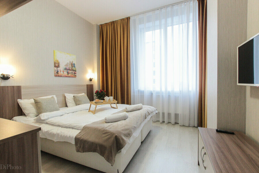 Номер на 18 этаже с панорамными окнами и просторной лоджией