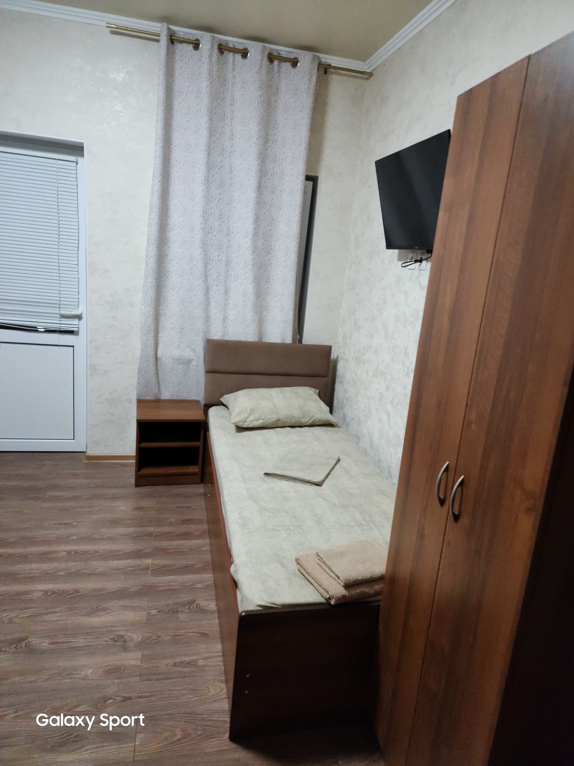 Трехместный номер с балконом