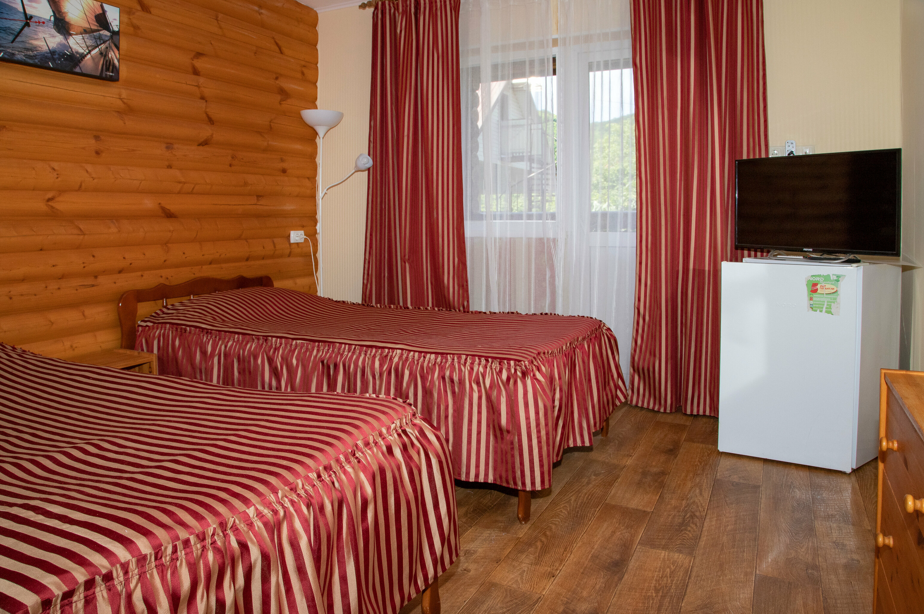 Двухместный номер с 2 отдельными кроватями и балконом