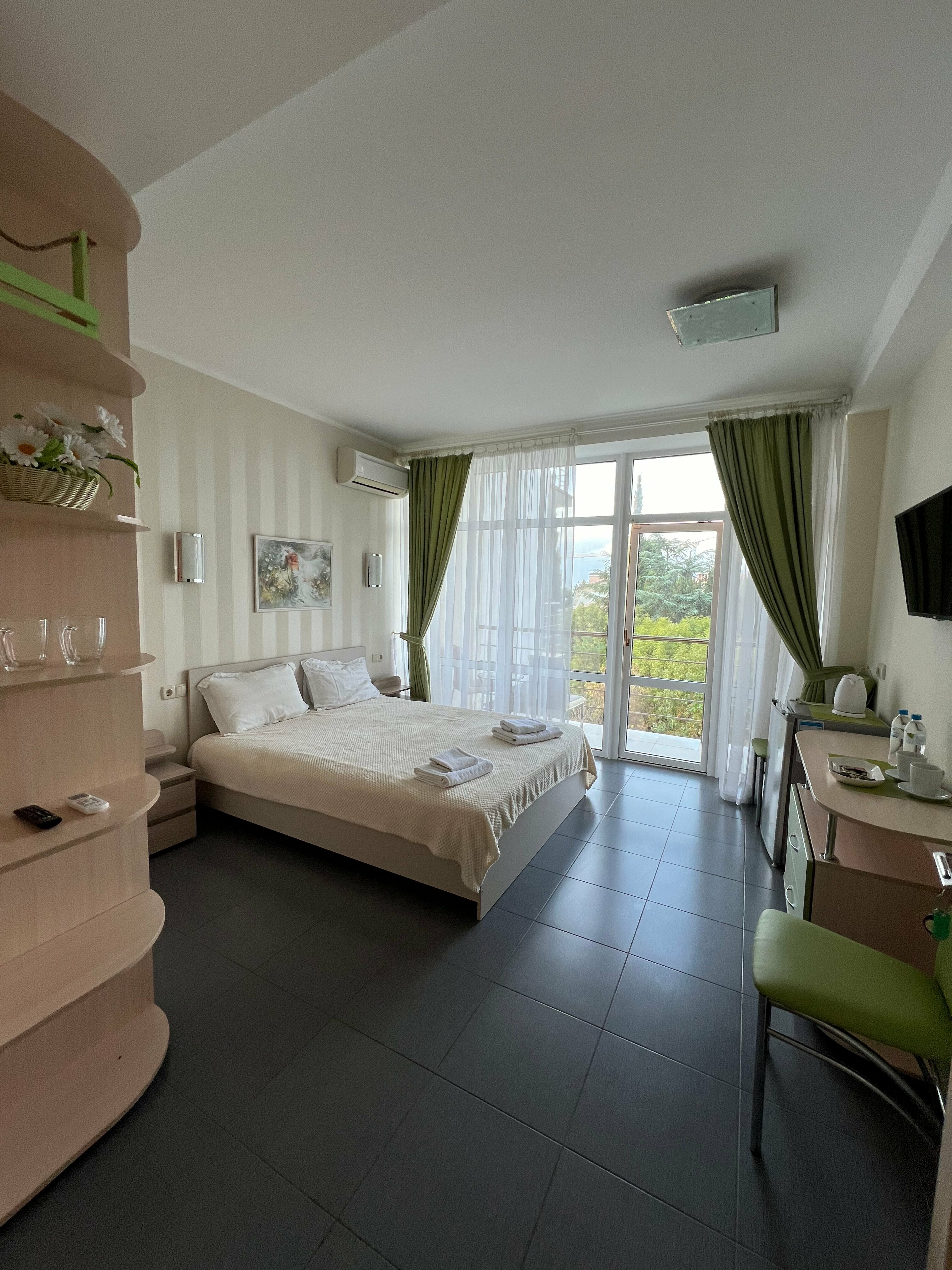 Двухместный номер Делюкс с 1 кроватью или 2 отдельными кроватями и балконом