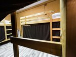 Кровать в 6-местном общем женском номере в Купеческий Дворъ