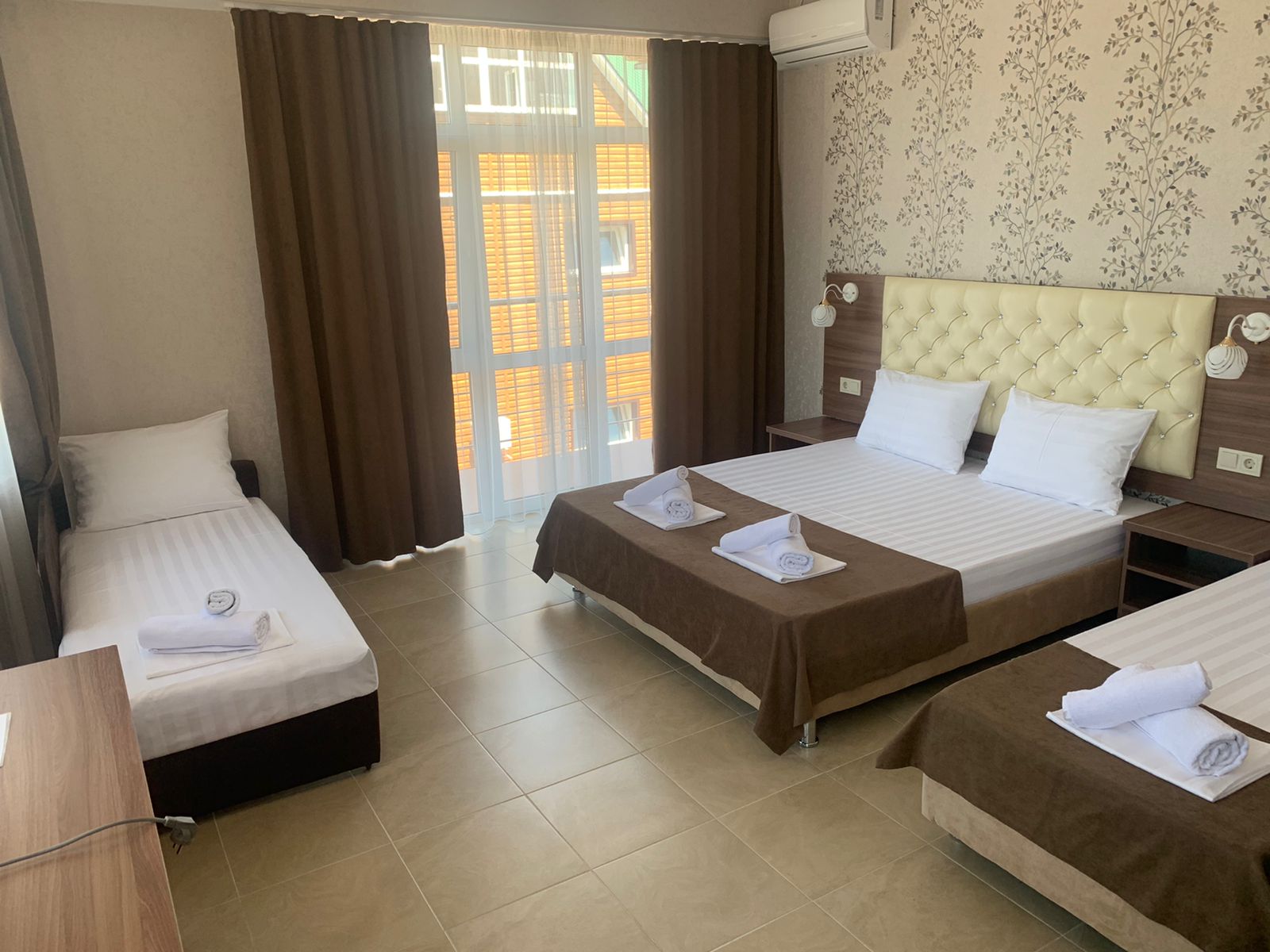 Трехместный номер Делюкс