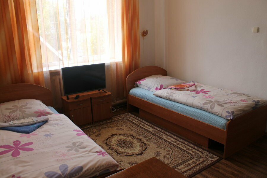 Улучшенный двухместный номер с 2 отдельными кроватями