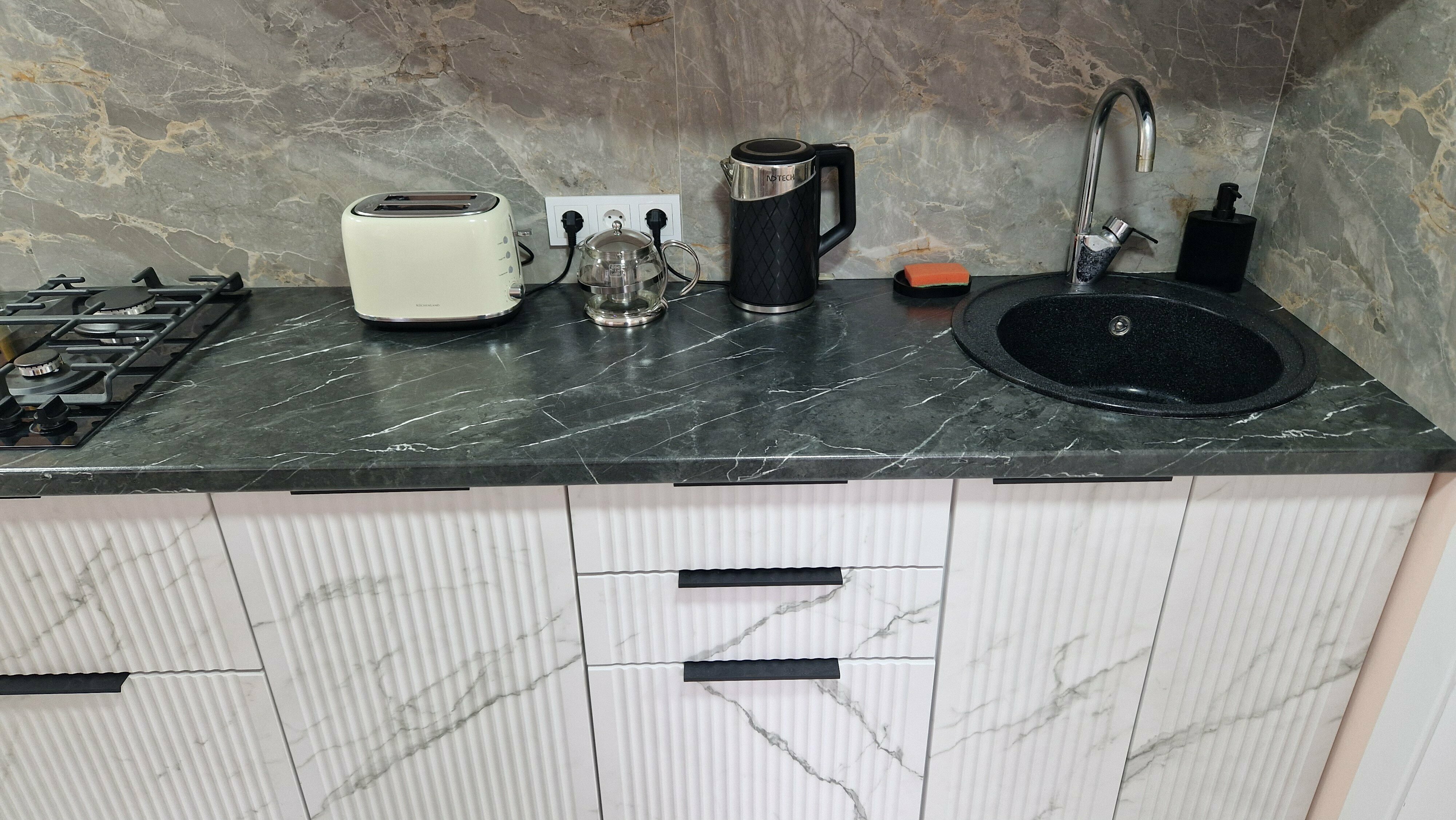 Двухместный номер с двуспальной кроватью и дополнительной кроватью