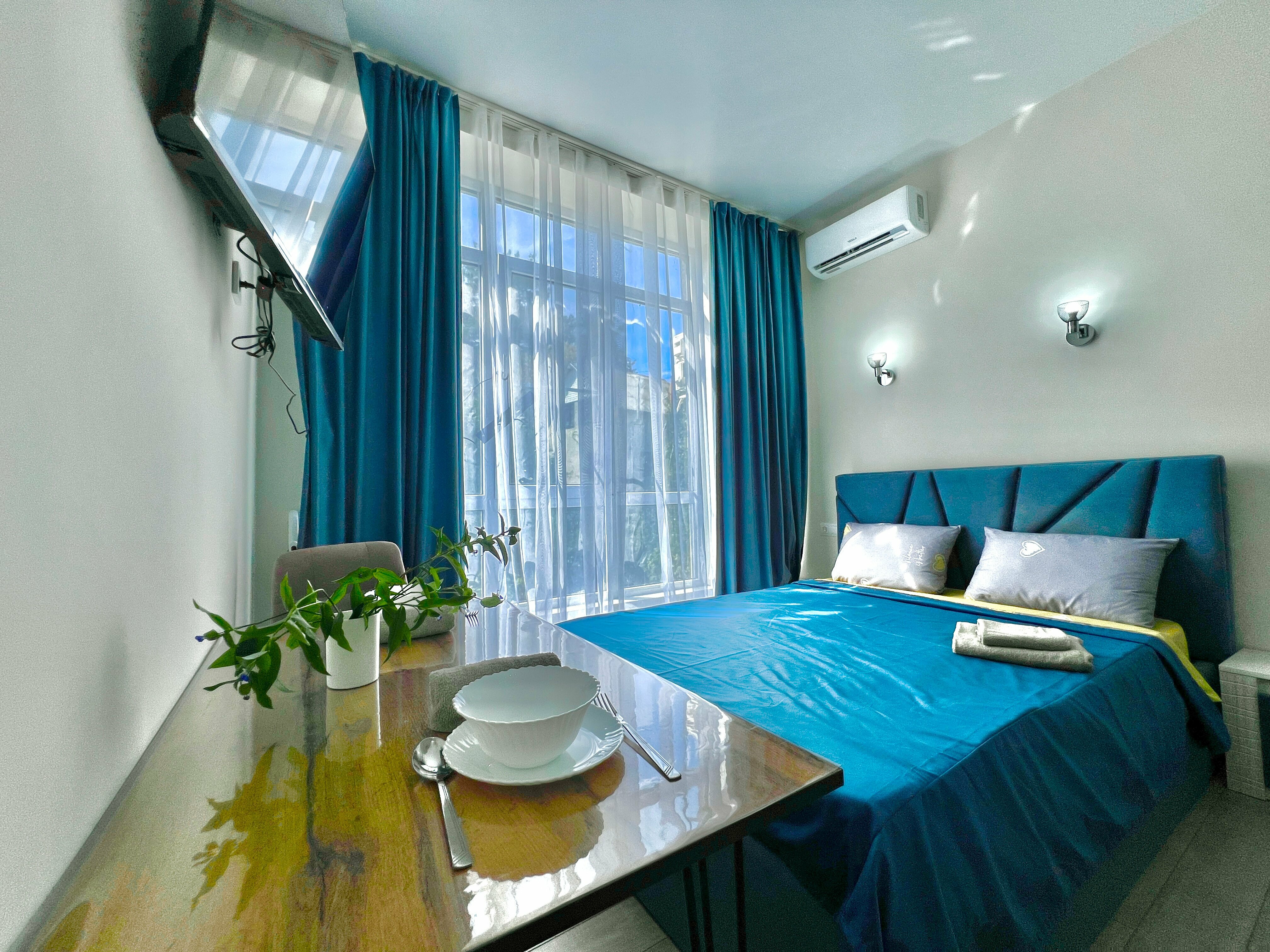 Четырехместный номер с балконом