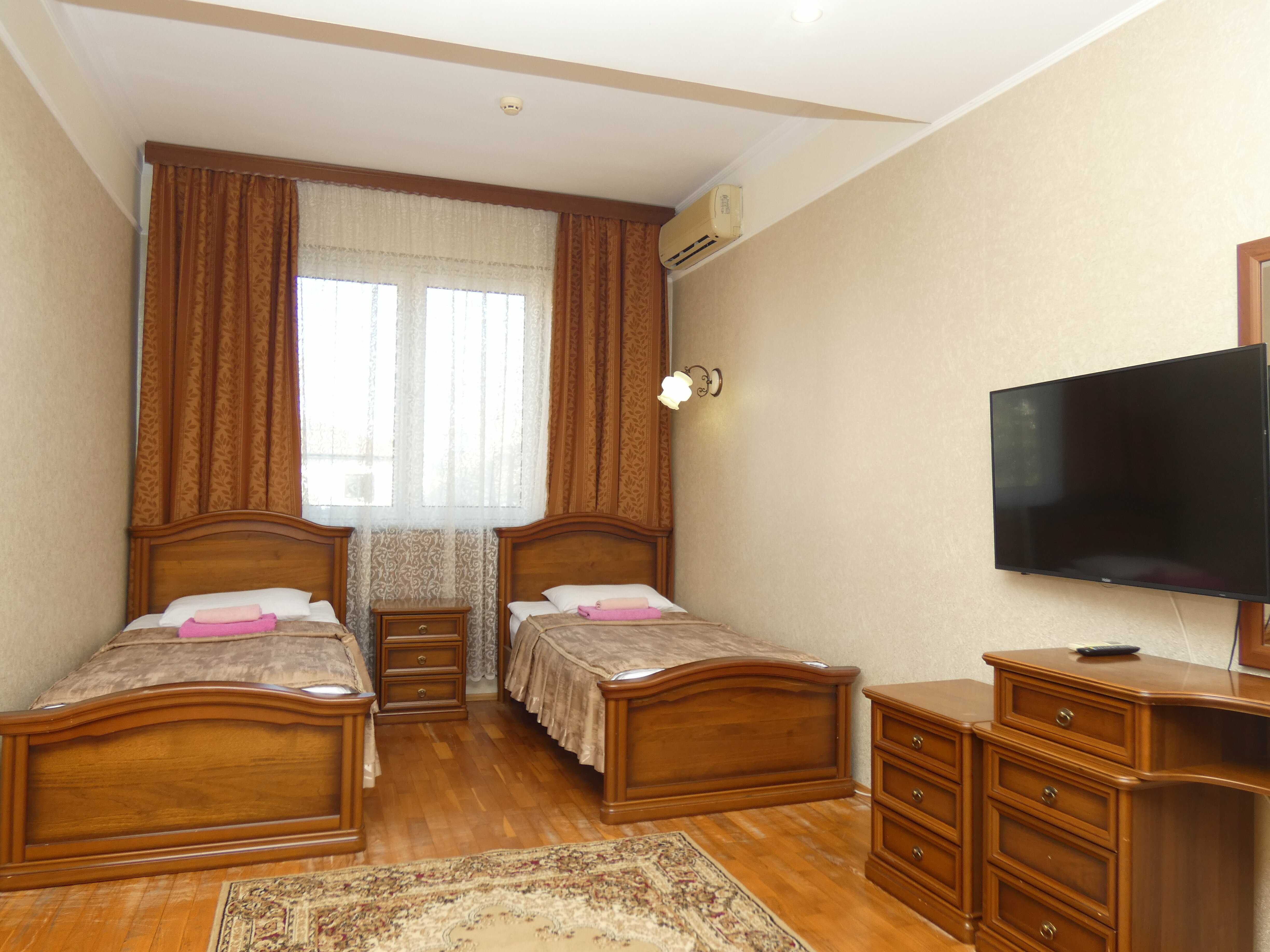 Двухместный номер с 2 отдельными кроватями и ванной