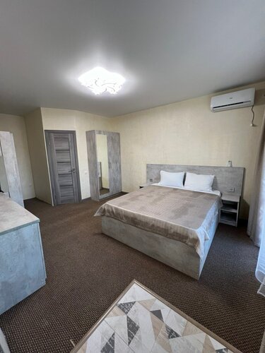 Улучшенный четырехместный номер в Созвездие